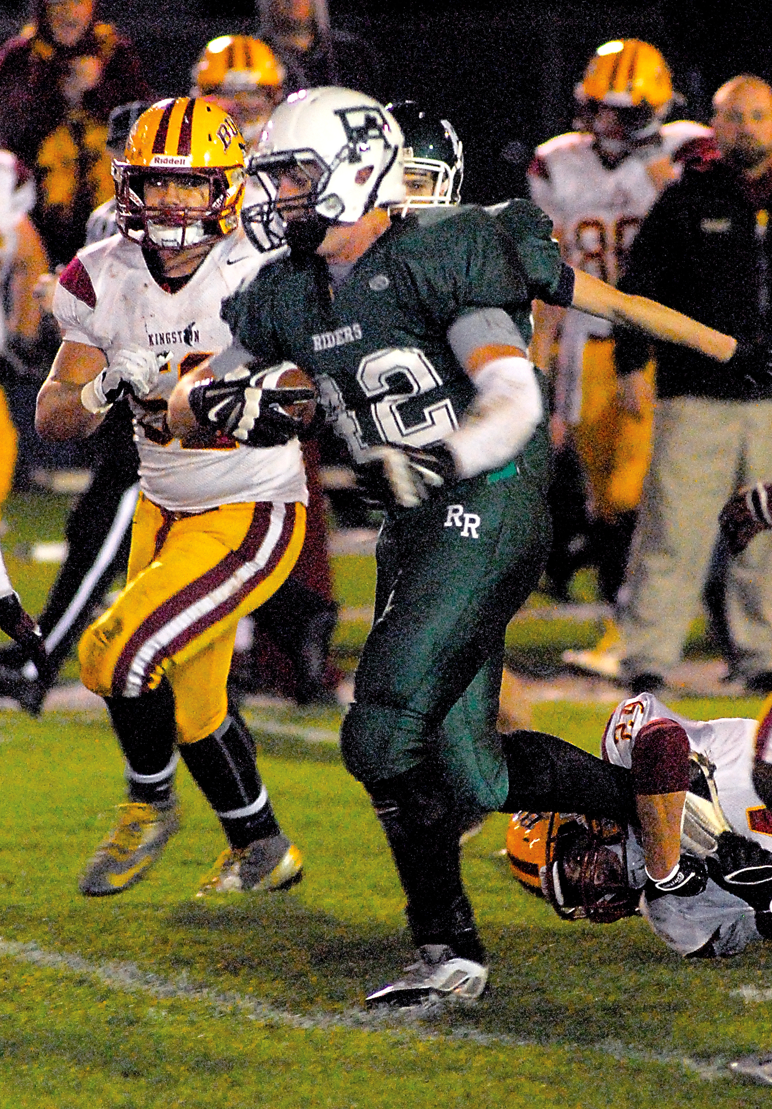 Port Angeles' Nick Lasorsa rushes for a short gain in the second quarter against Kingston. Keith Thorpe/Peninsula Daily News