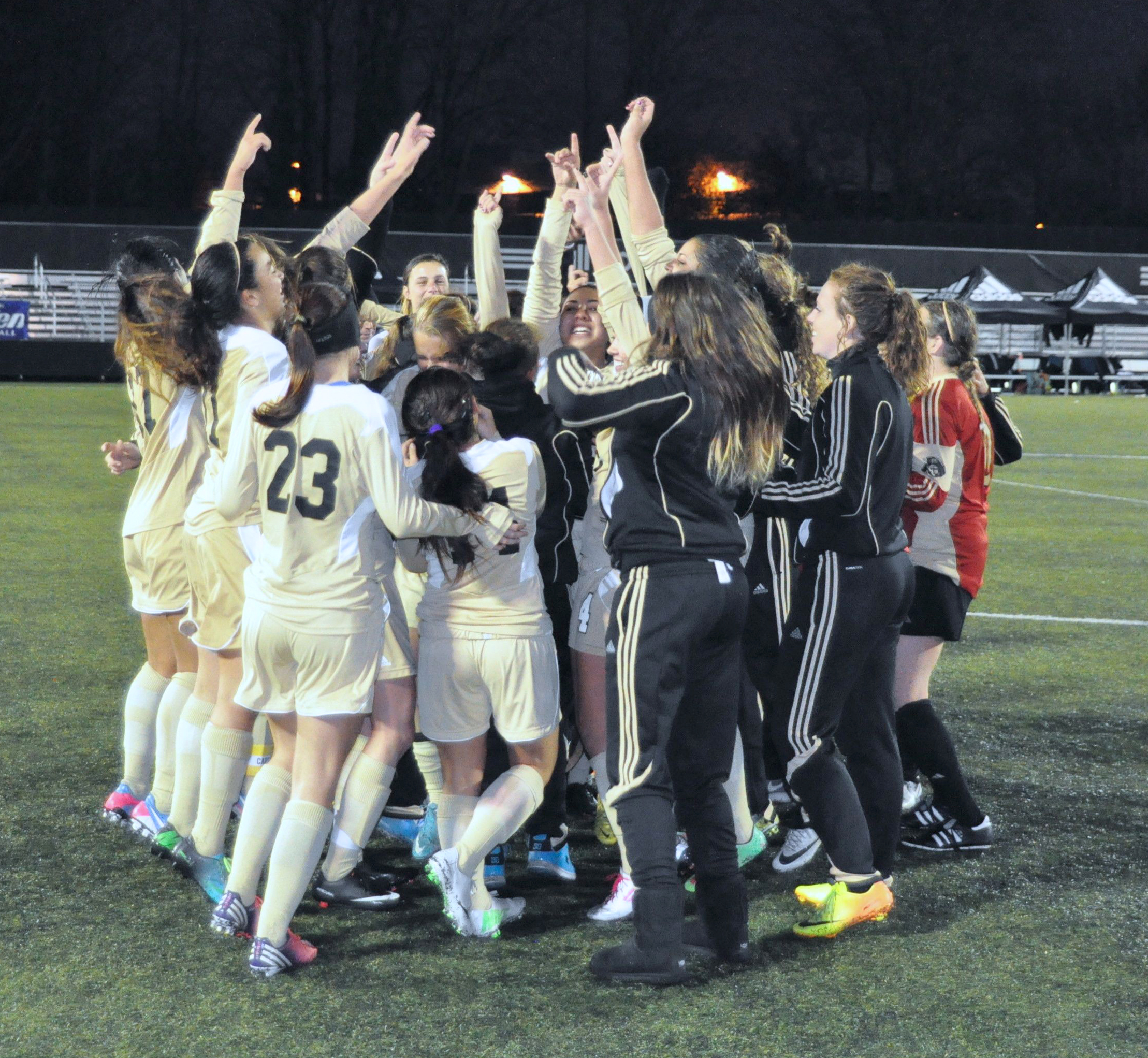 The Peninsula College women's team celebrates after defending its NWAACC championship. Jeff Halstead/for Peninsula Daily News