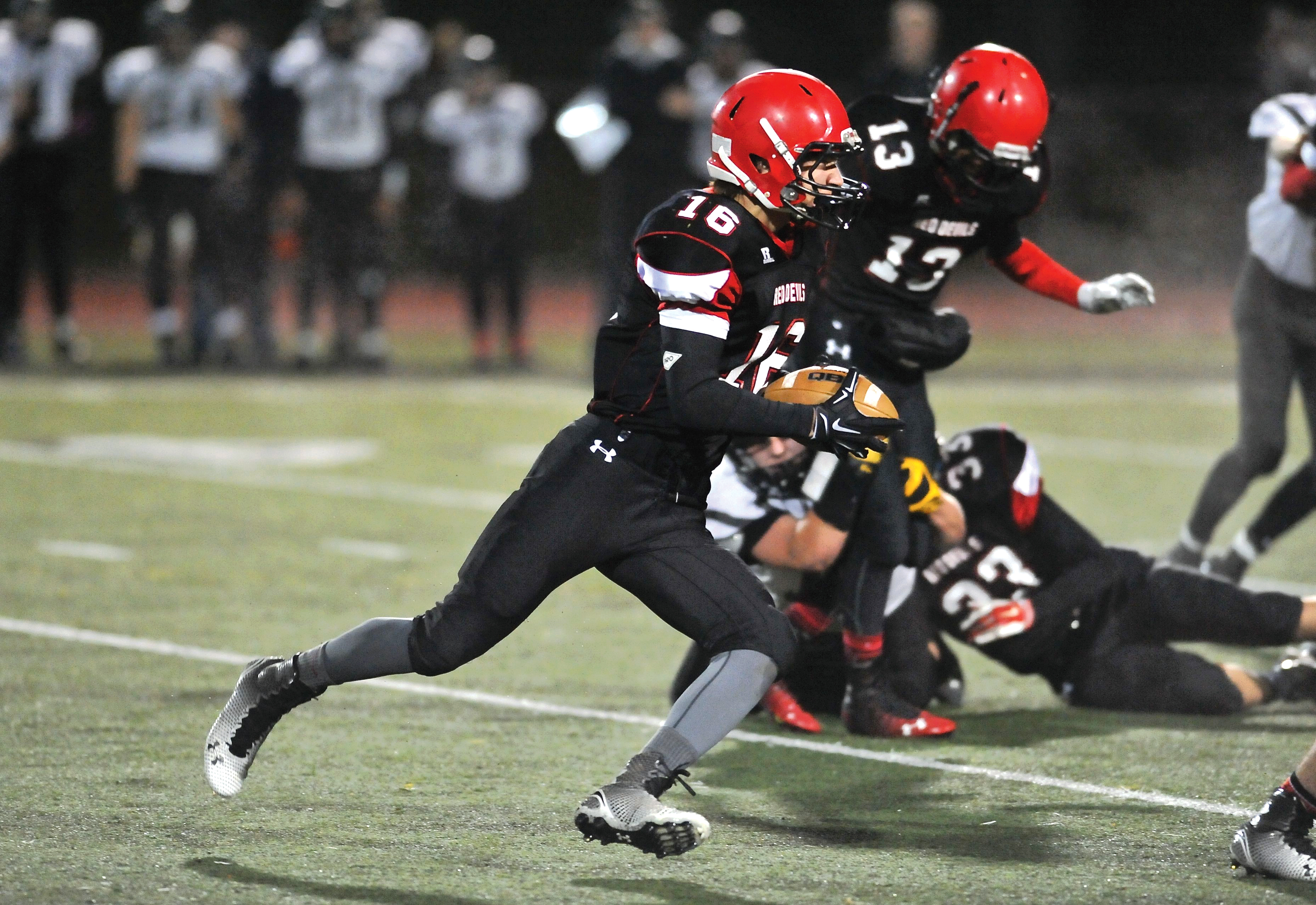 Neah Bay running back Cole Svec scored three quick touchdowns to help start the Red Devils' 74-12 rout of the Twin Valley Wolfpack in the Class 1B state quarterfinals at Silverdale Stadium. Jeff Halstead/for Peninsula Daily News