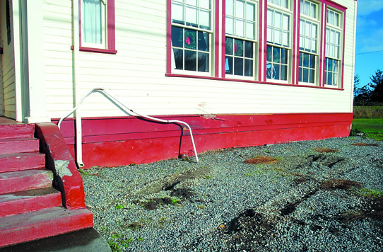 Damage to the Old Dungeness Schoolhouse north of Sequim is seen on Tuesday. Keith Thorpe/Peninsula Daily News