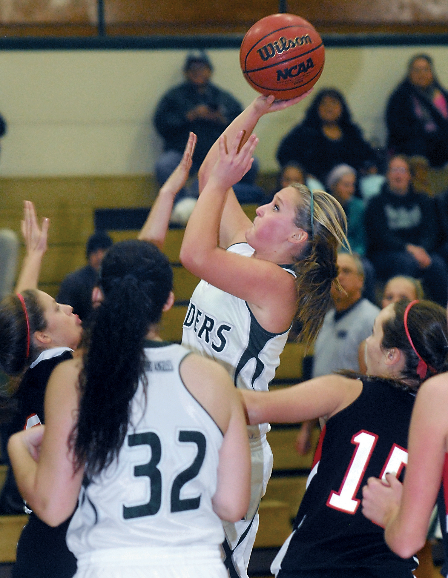 Port Angeles' Hayley Baxley shoots from a crowded lane against Archbishop Murphy. Keith Thorpe/Peninsula Daily News