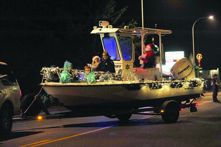 The Clallam County Sheriff's Office boat is all decked out with lights and decorations for the 2012 Twinkle Light Holiday Parade in Forks. Lonnie Archibald/for Peninsula Daily News