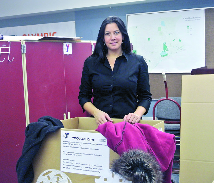 Amanda Funaro is coordinating the YMCA coat drive in Port Townsend. Charlie Bermant/Peninsula Daily News