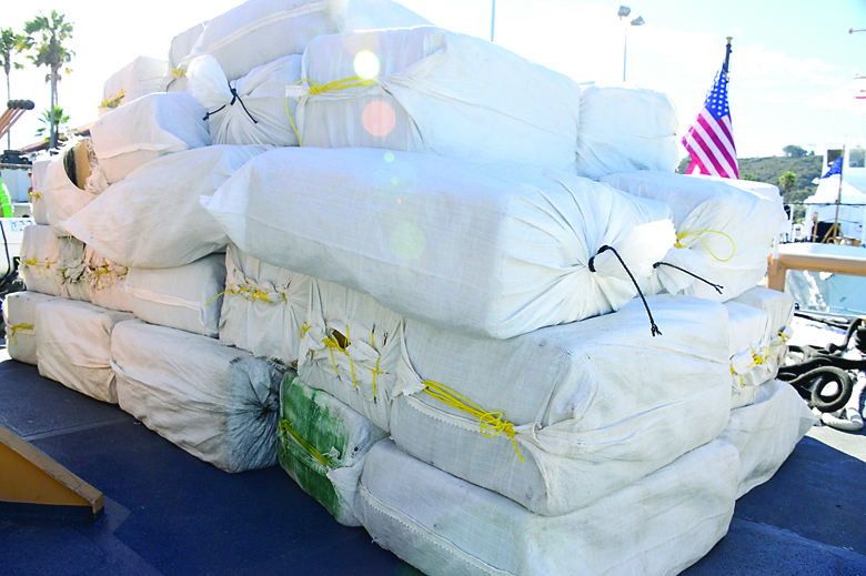 Several bales of marijuana seized from a panga sit on the deck of the Coast Guard cutter Edisto before being transferred to the San Diego Marine Task Force at Naval Base Point Loma on Wednesday. The 30-foot panga was intercepted approximately 155 miles south of San Diego. Petty Officer 3rd Class Connie Gawrelli/ U.S. Coast Guard