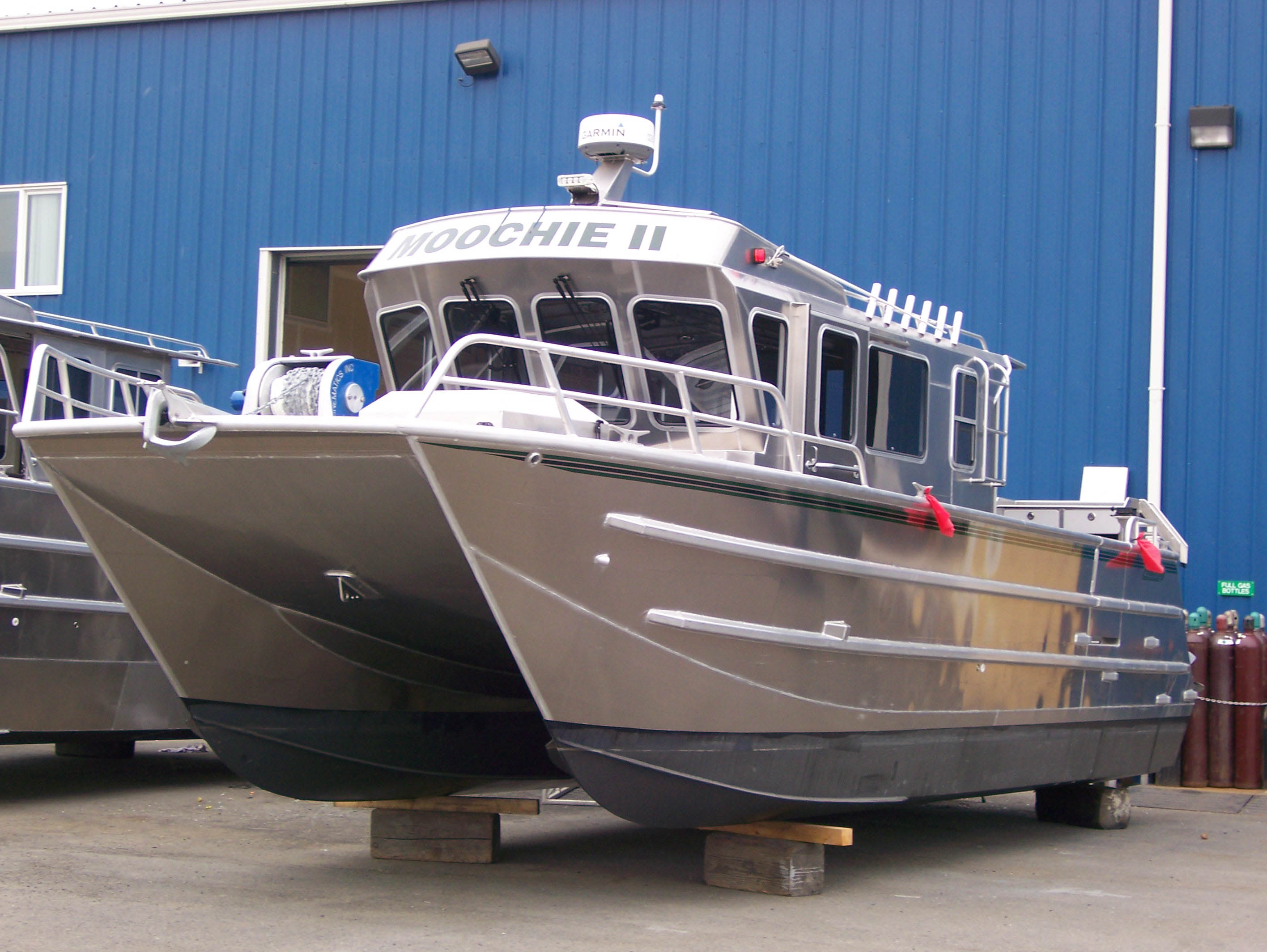 One of Armstrong Marine's Elite 35 Series pleasure craft is shown outside the company's Port Angeles plant last April. This 34-foot-long