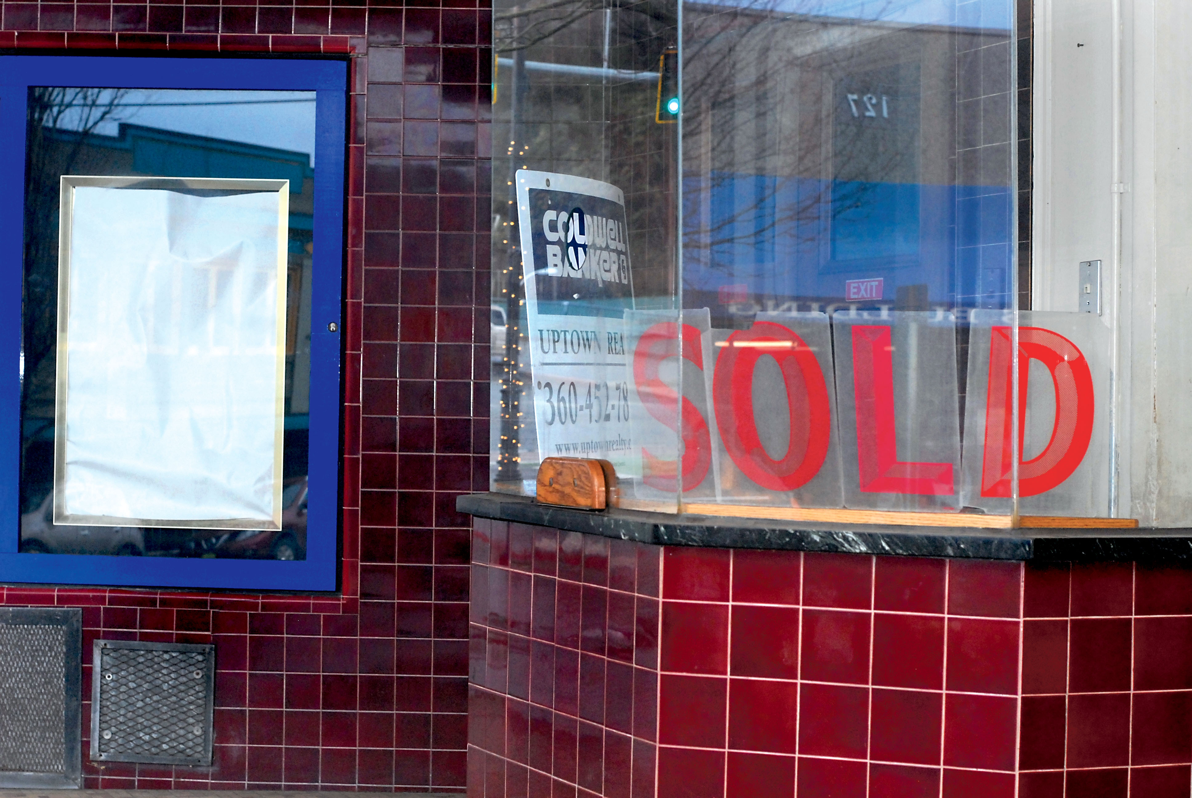 Marquee letters in the Lincoln Theater box office send the message that the 1916 movie house has a "pending sale