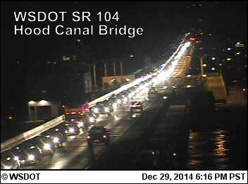 The Hood Canal Bridge webcam shows traffic snarled on the floating bridge looking toward the Kitsap County mainland following Monday's collision that was blocking part of state Highway 104. Washington Department of Transportation