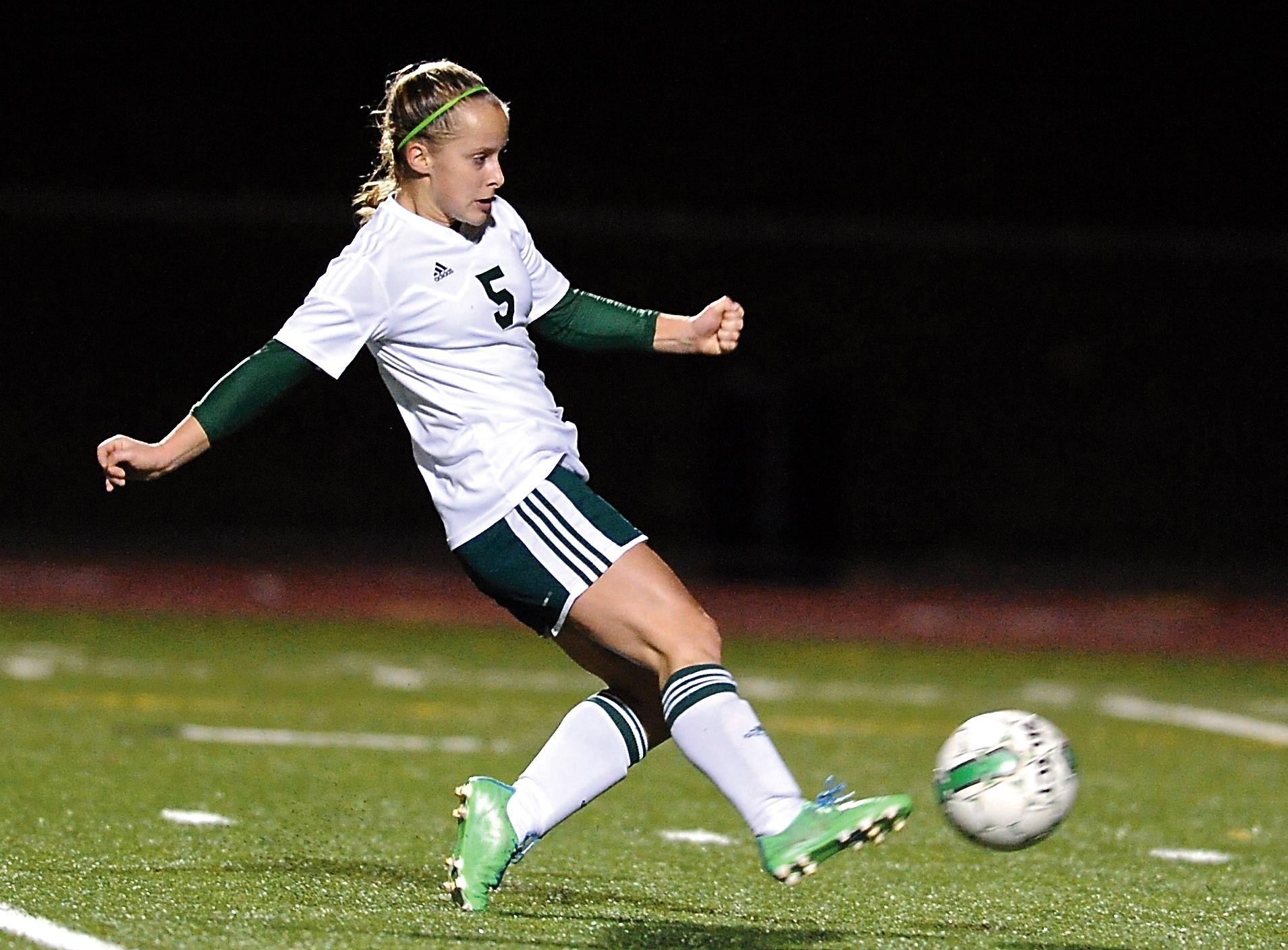 Port Angeles' Sierra Robinson shoots and scores during a Class 2A district playoff game with Orting at Silverdale Stadium on Tuesday. Jeff Halstead/for Peninsula Daily News