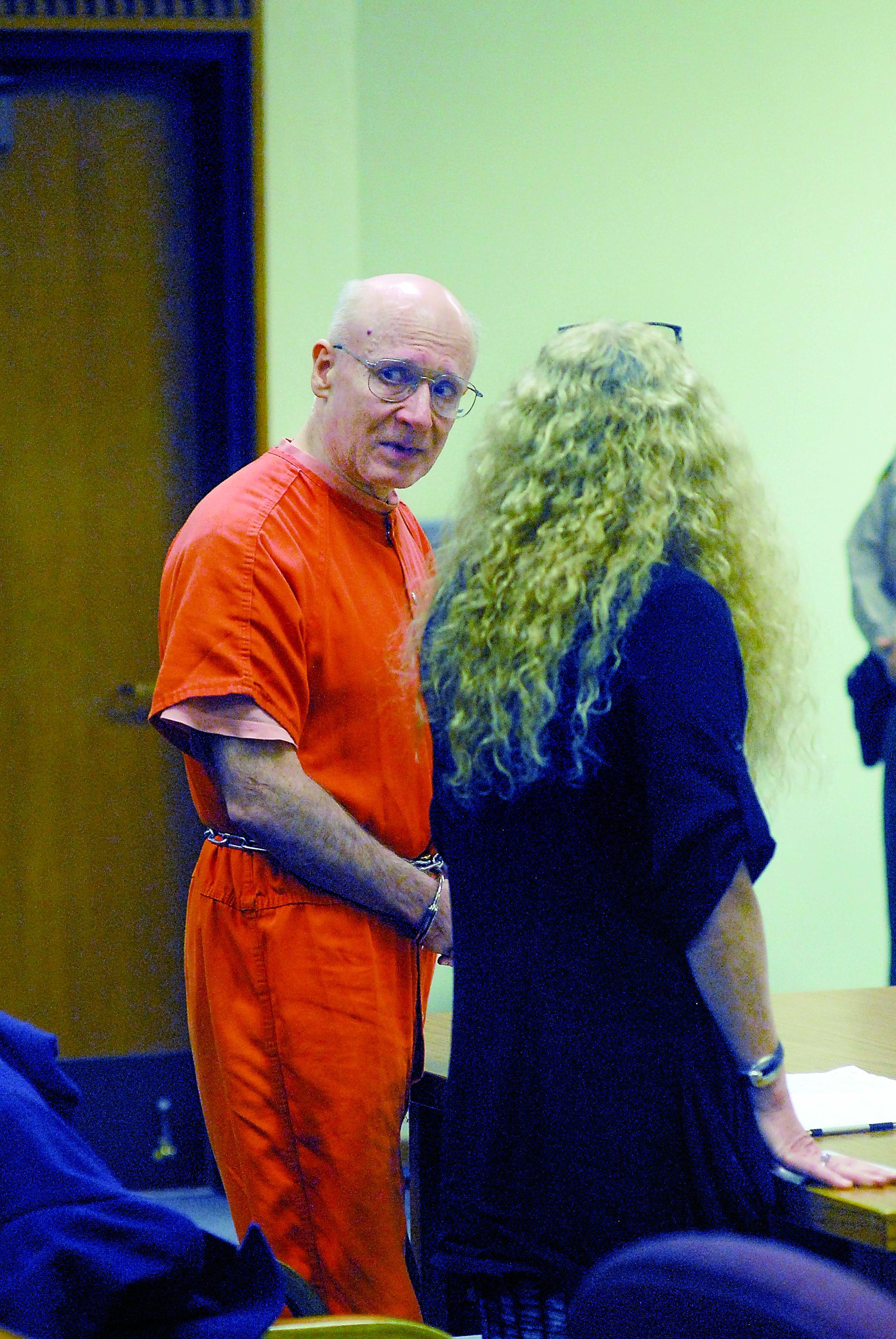 Bobby J. Smith looks back at the audience as he stands next to attorney Karen Unger during Smith’s sentencing for second-degree murder in Clallam County Superior Court in Port Angeles on Tuesday. — Keith Thorpe/Peninsula Daily News