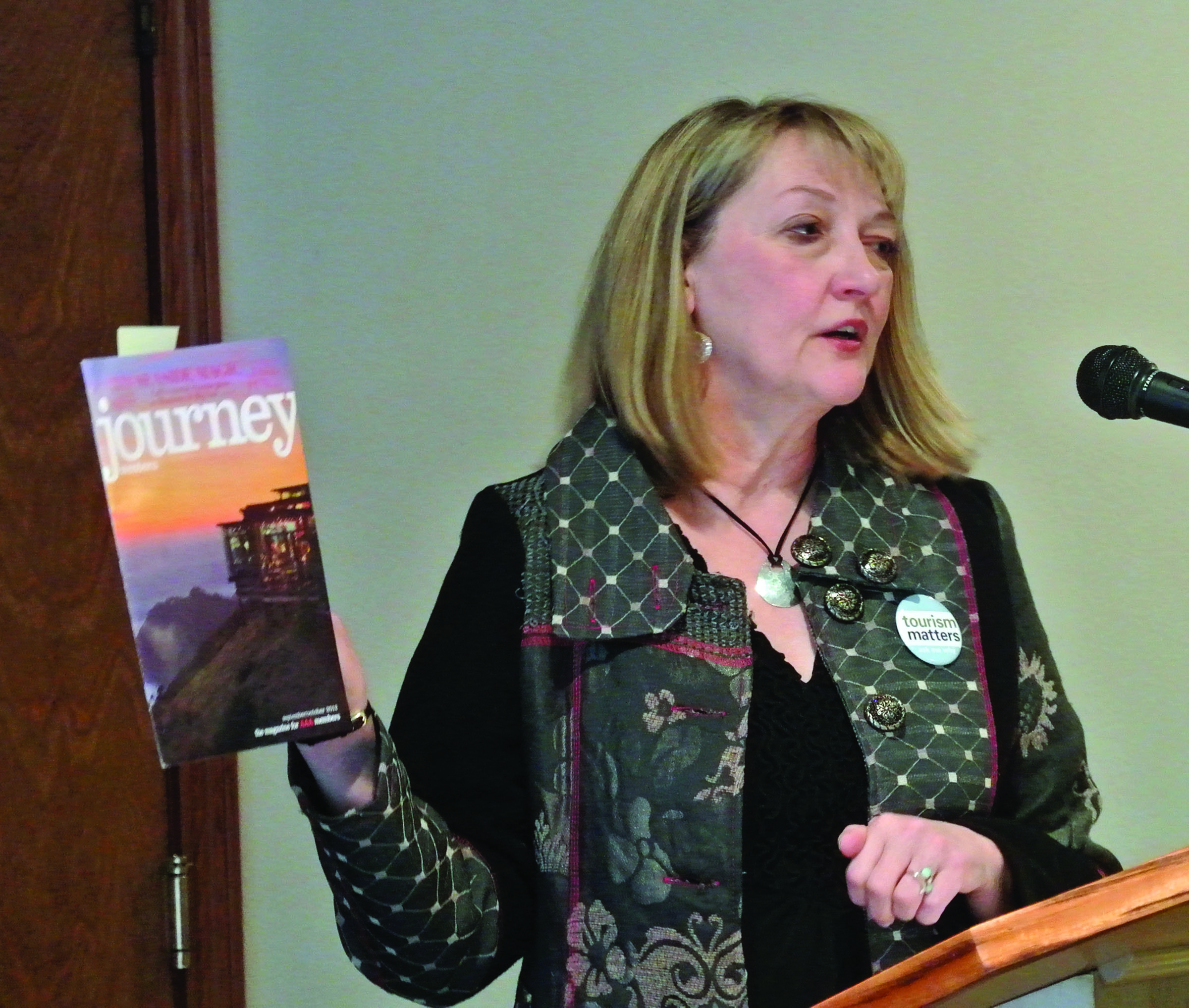 Port Townsend City Marketing Director Christina Pivarnik addresses the Jefferson County Chamber of Commerce on Monday.  -- Photo by Charlie Bermant/Peninsula Daily News