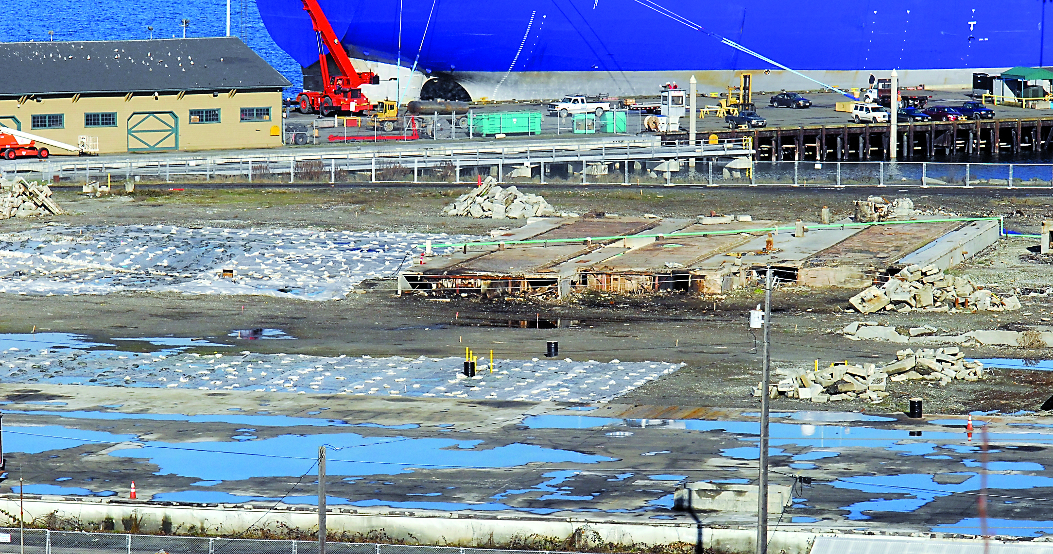 Building foundations and piles of concrete rubble remain at the former Peninsula Plywood mill site in Port Angeles. — Keith Thorpe/Peninsula Daily News