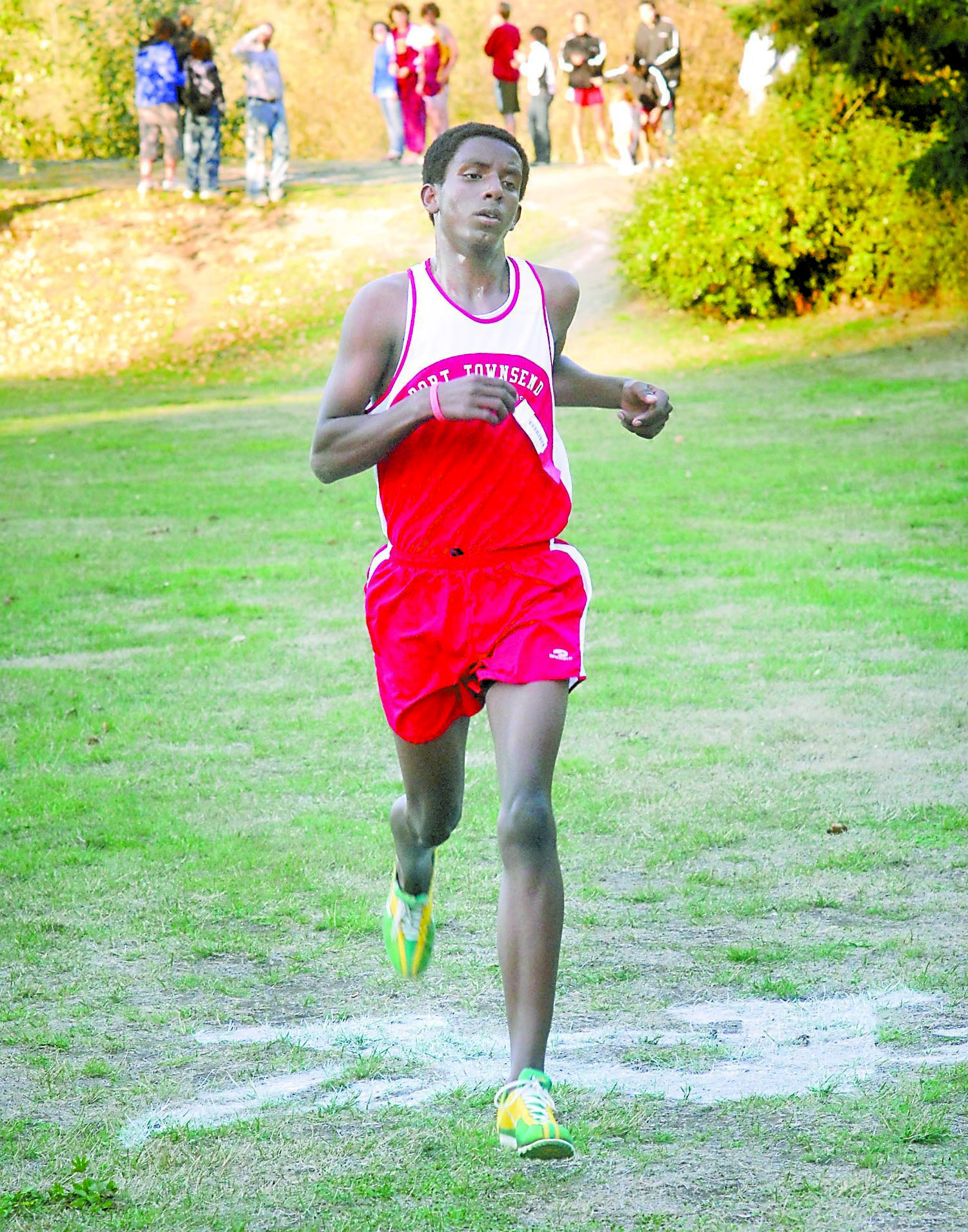 Bereket Piatt crosses the finish line of a North Olympic Peninsula cross-country meet for Port Townsend High School in 2009. Keith Thorpe/Copyright &Copy; 2013