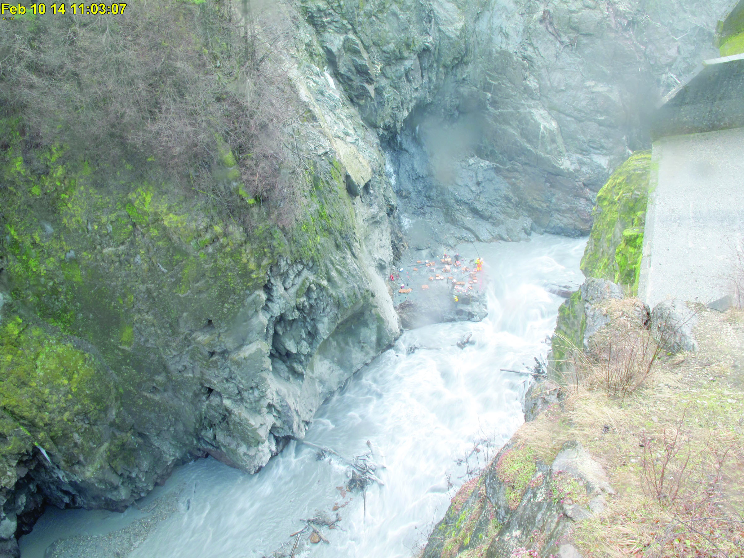 This webcam image shows blast preparations being performed Monday afternoon on the remaining stub of Glines Canyon Dam. — Olympic National Park