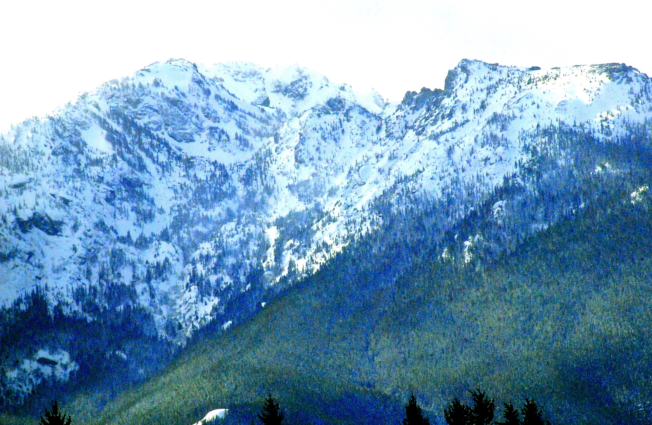 Snow covers much of Rocky Peak and the Klahhane Ridge area within Olympic National Park on Thursday. — Keith Thorpe/Peninsula Daily News