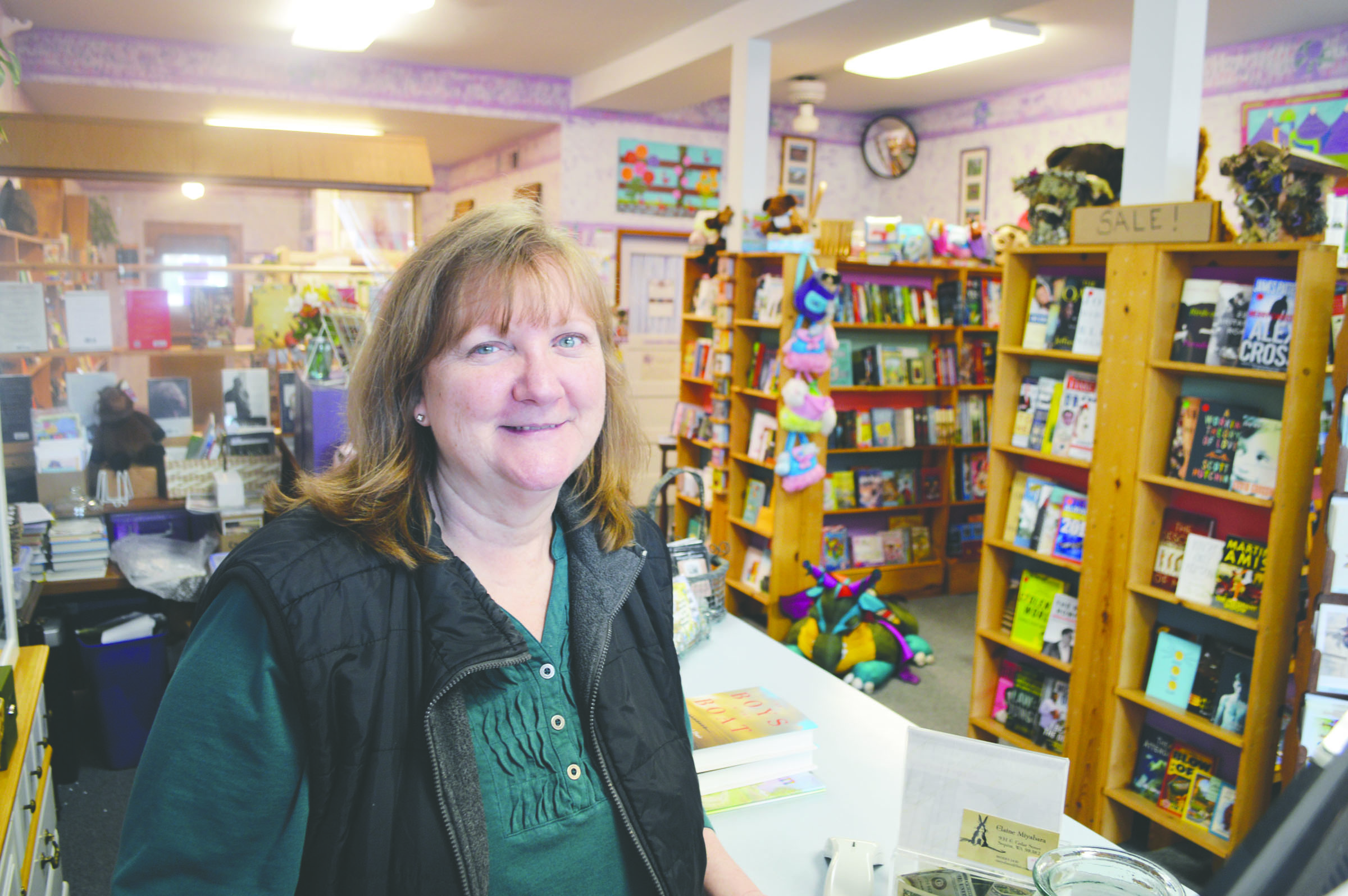 Vickie Maples is looking for a buyer for Pacific Mist Books in Sequim as family health issues are causing her to close the book shop at the end of March. — Joe Smillie/Peninsula Daily News