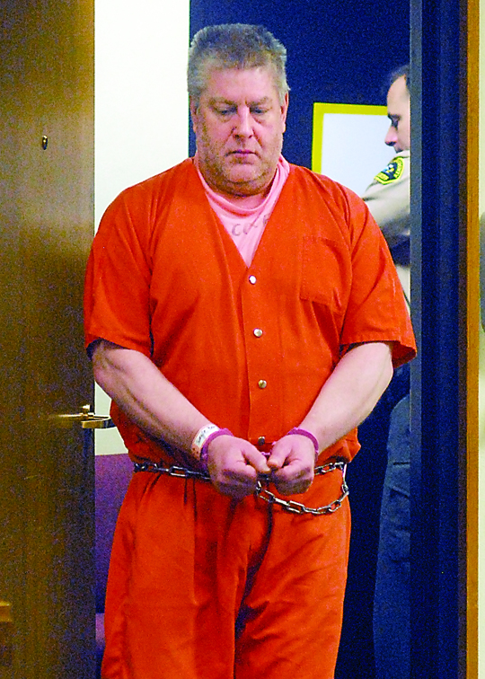 Barry Swegle enters Clallam County Superior Court in Port Angeles on Wednesday for a status hearing. Keith Thorpe/Peninsula Daily News