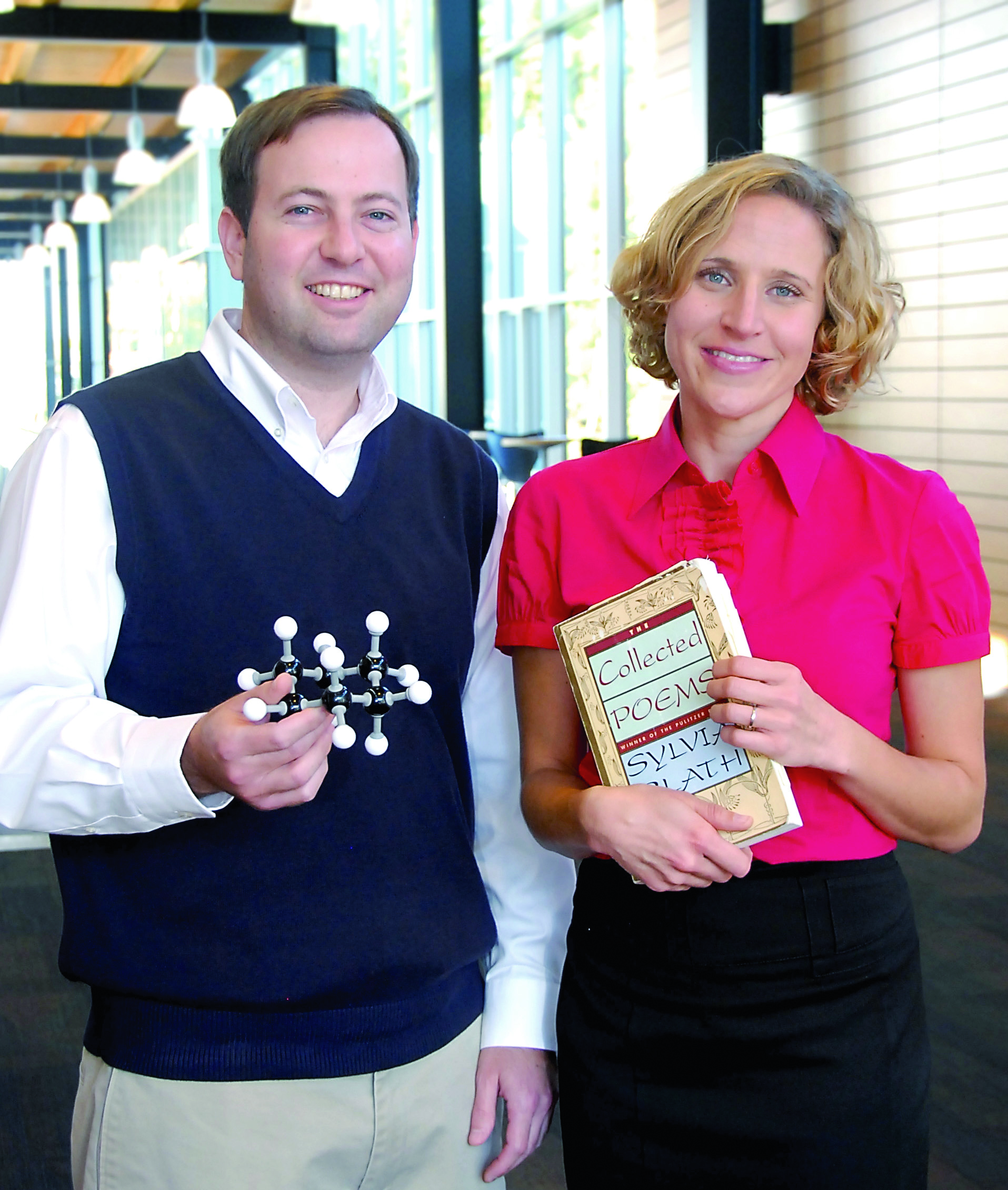 Benjamin Weintraub and Helen Lovejoy pause on the Peninsula College Port Angeles campus.