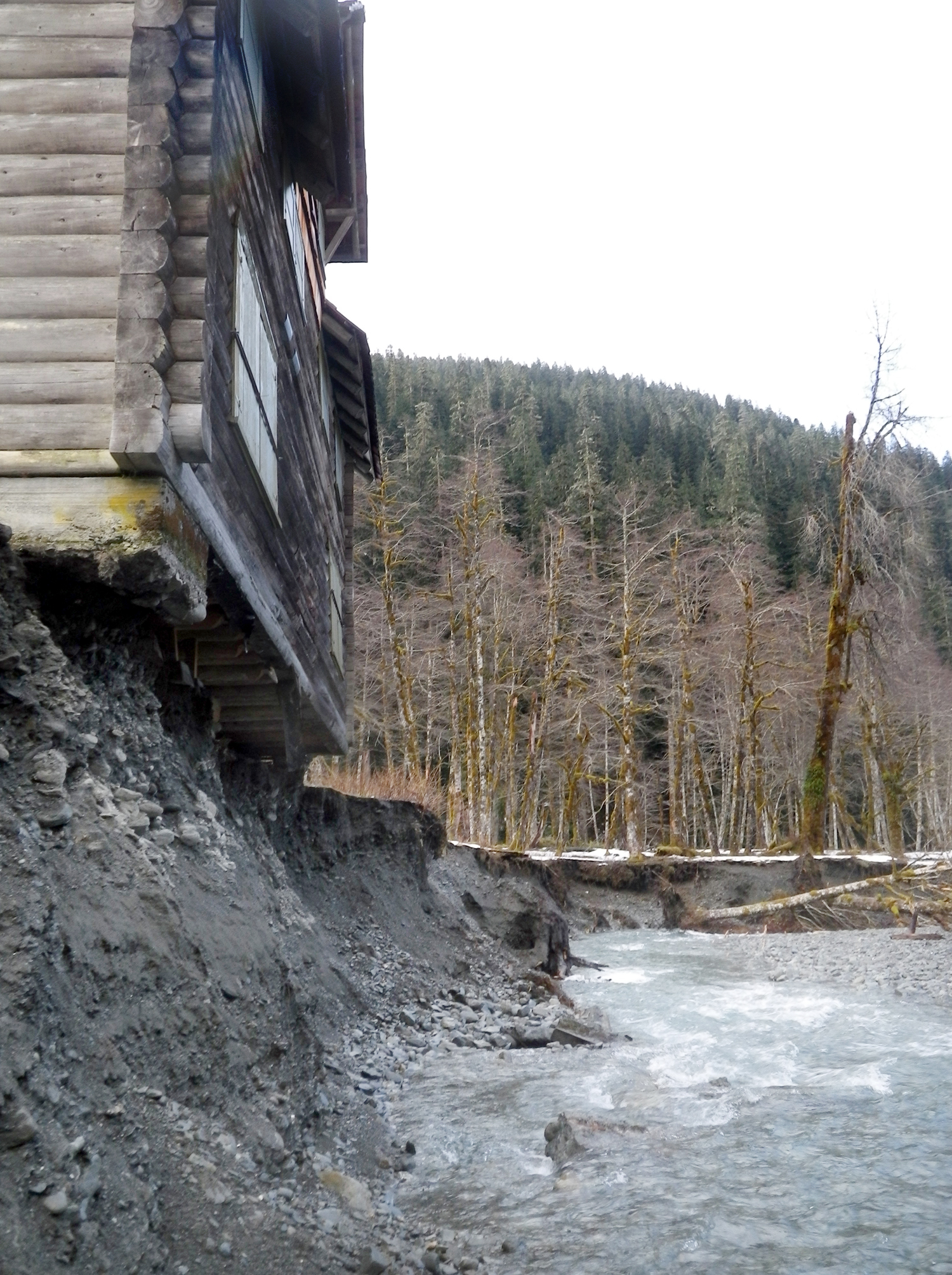 The Enchanted Valley Chalet in Olympic National Park has been undercut by the East Fork of the Quinault River. Olympic National Park