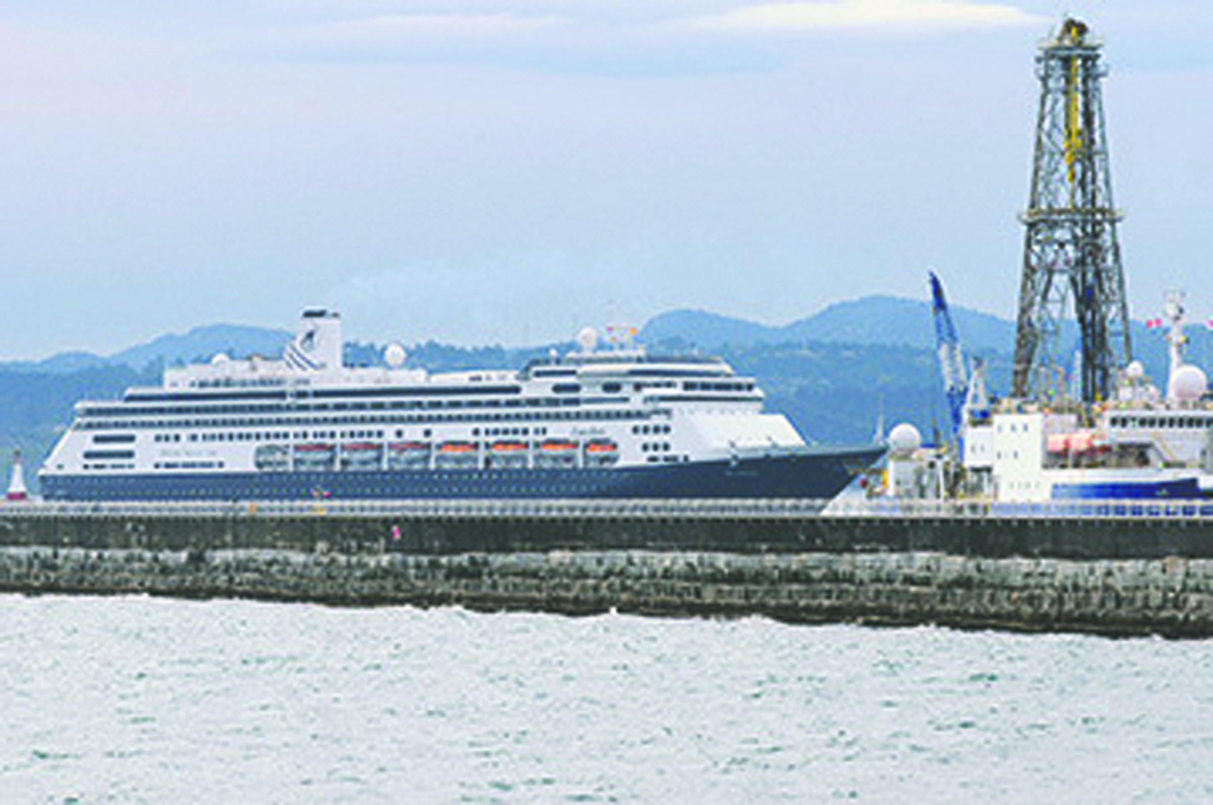 The first cruise ship of the season in Victoria — Holland America’s ms Zaandam — pulls into Ogden Point in this photo from the PDN’s sister newspaper