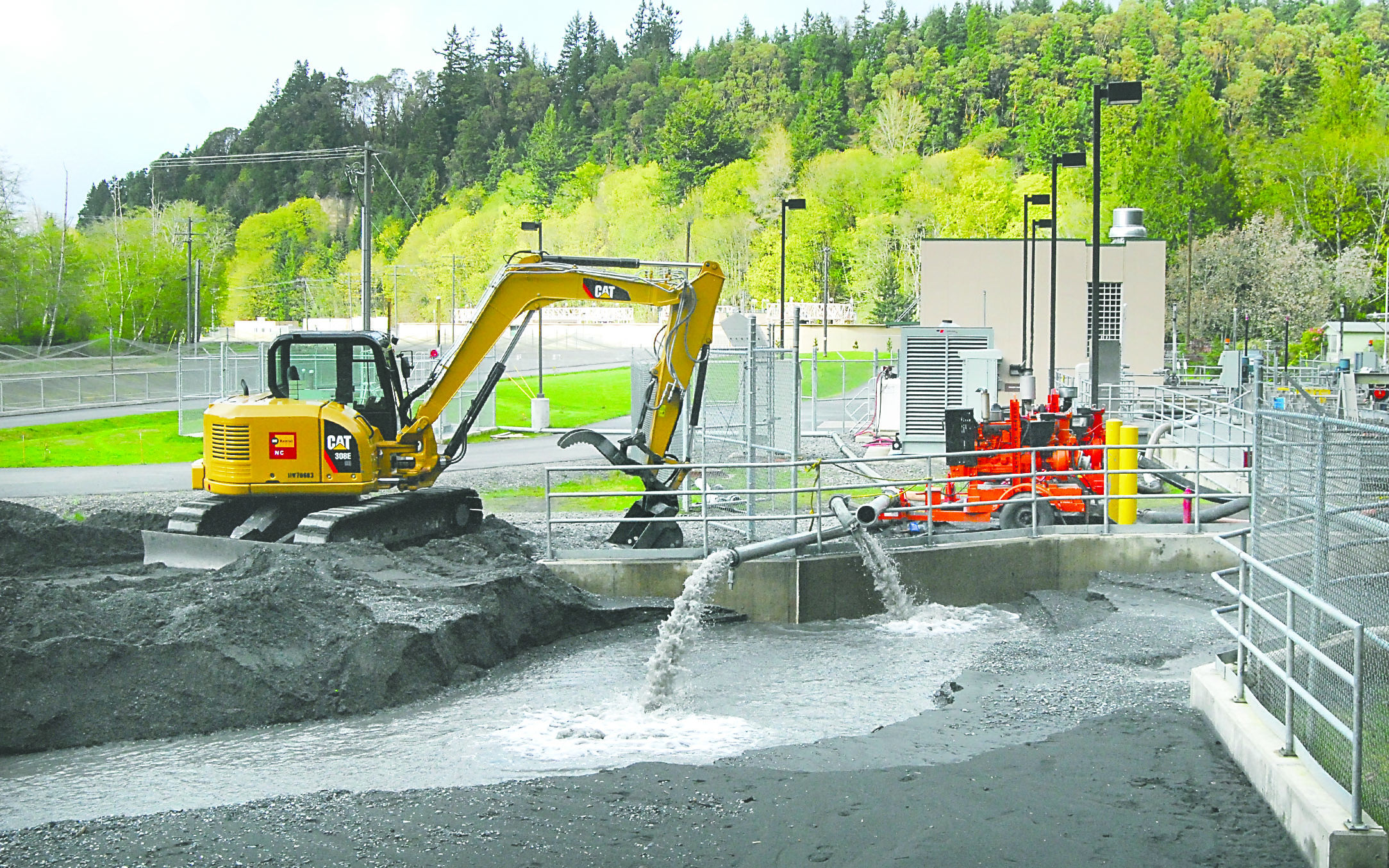 Silt-laden water is pumped from an intake channel for the industrial water treatment plant along the Elwha River last week.  -- Photo by Keith Thorpe/Peninsula Daily News