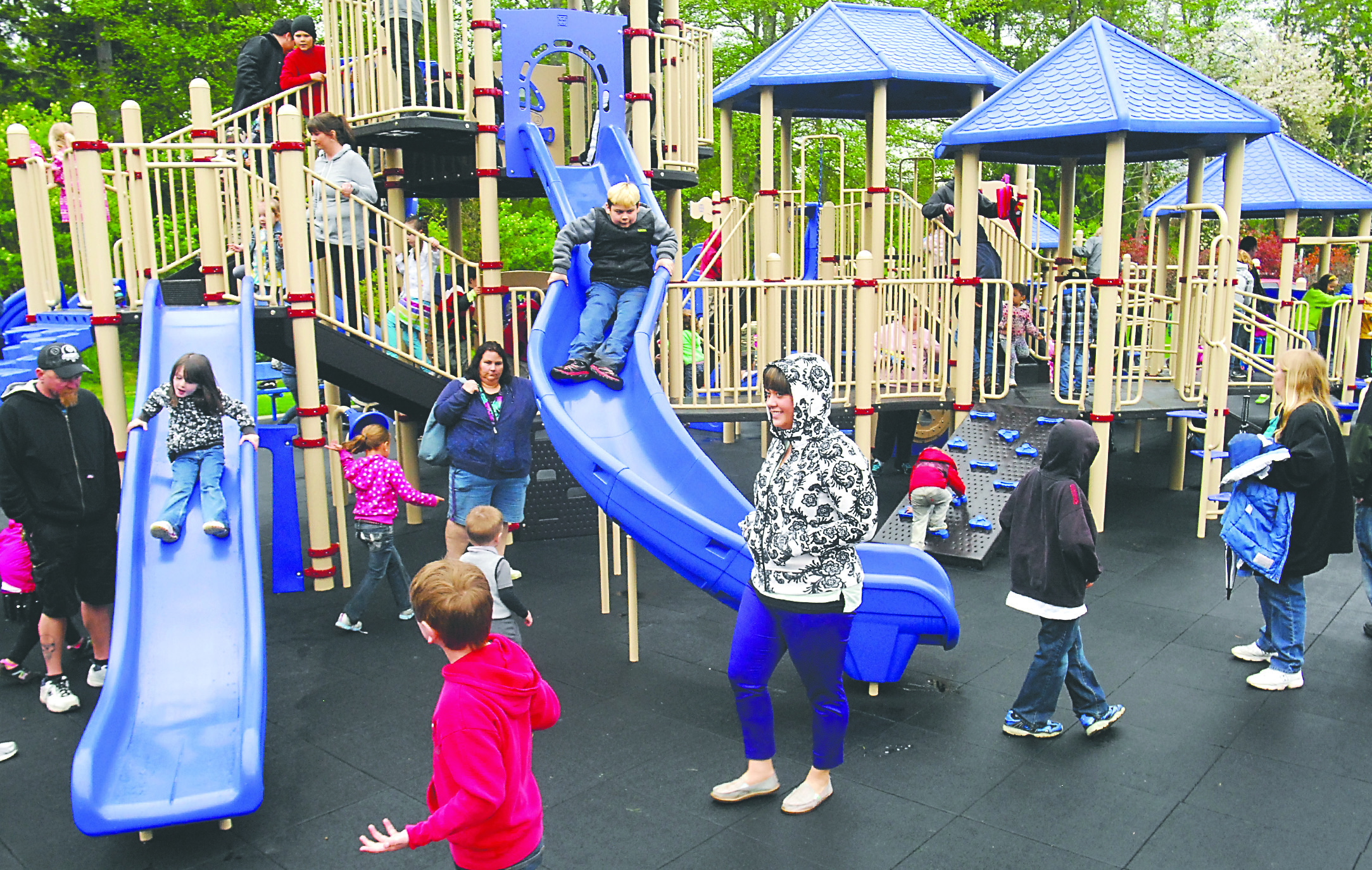 The scene at Saturday’s grand opening of the Shane Park playground in Port Angeles.  -- Photo by Keith Thorpe/Peninsula Daily News