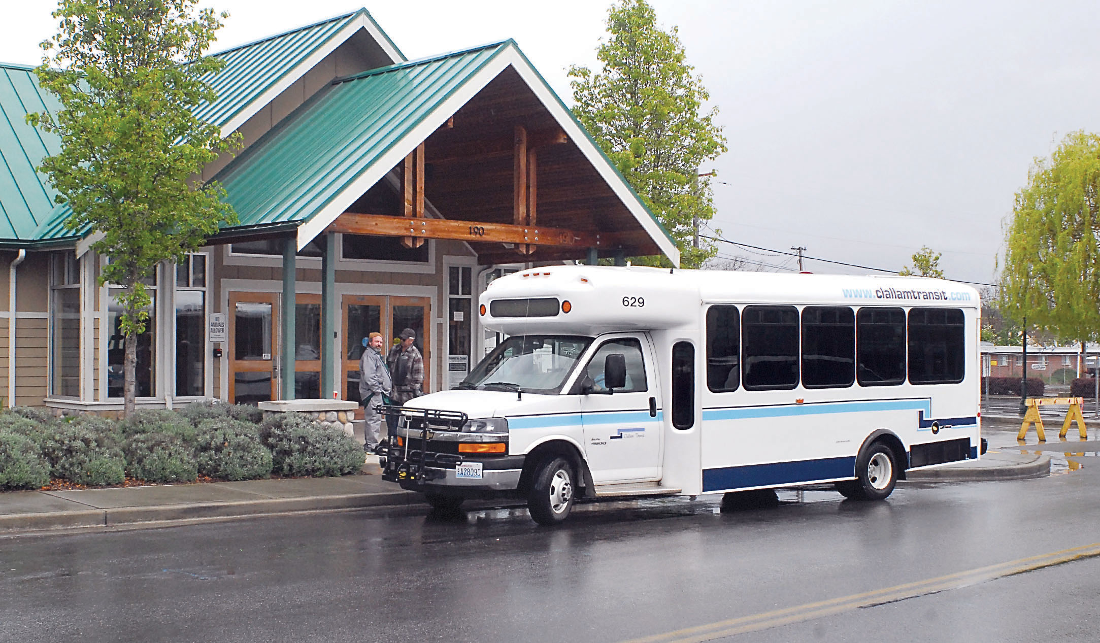 A Clallam Transit bus parks at a temporary bus stop on Cedar Street in front of the Sequim Transit Center after the regular bus lane was closed to accommodate construction of the new Sequim City Hall.  —Photo by Keith Thorpe/Peninsula Daily News