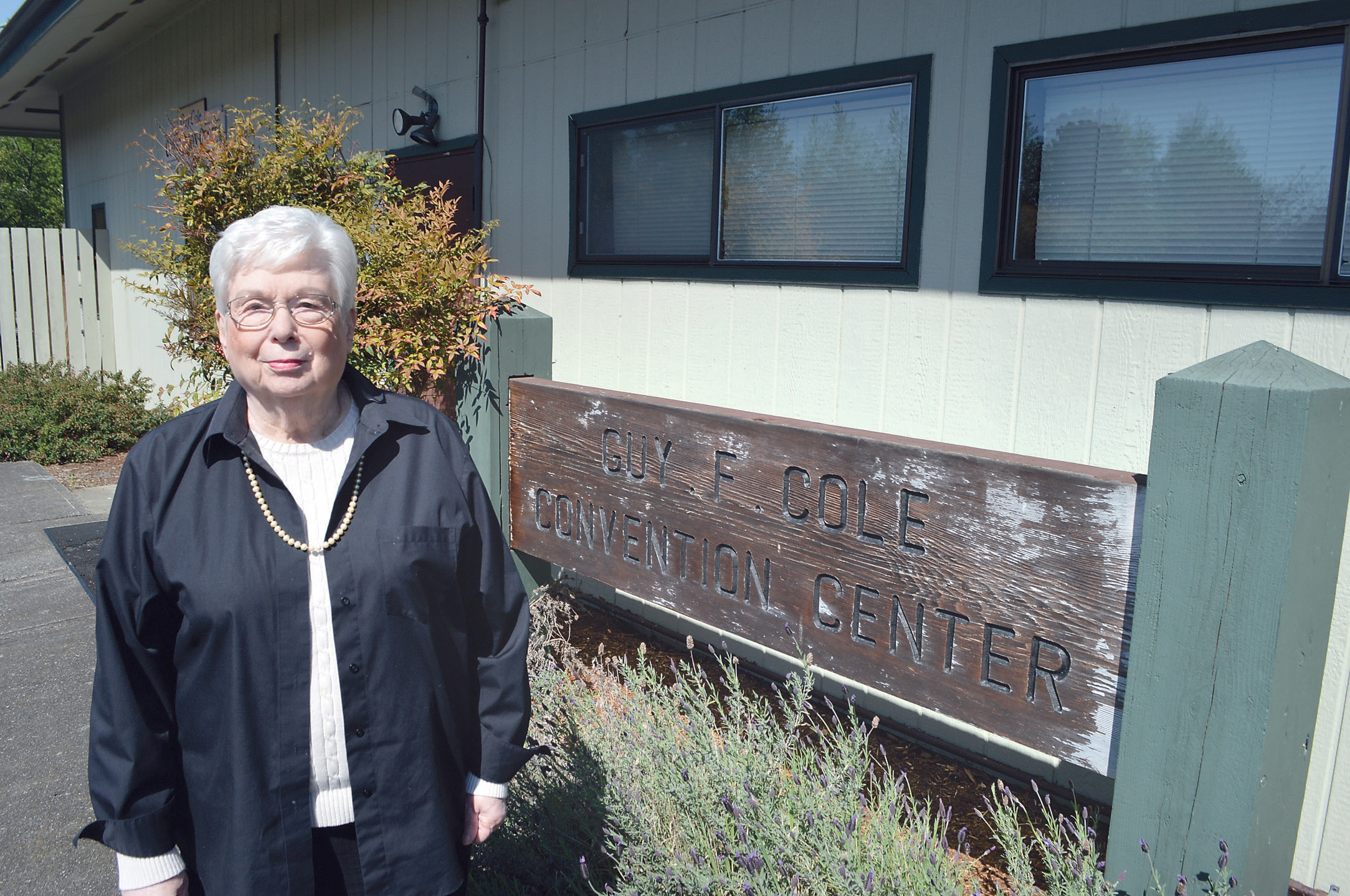 Pat Johansen stands in front of the Guy Cole Convention Center in Sequim on Tuesday. Johansen will lead an effort in the coming months to study a revitalization of the city’s seldom-used