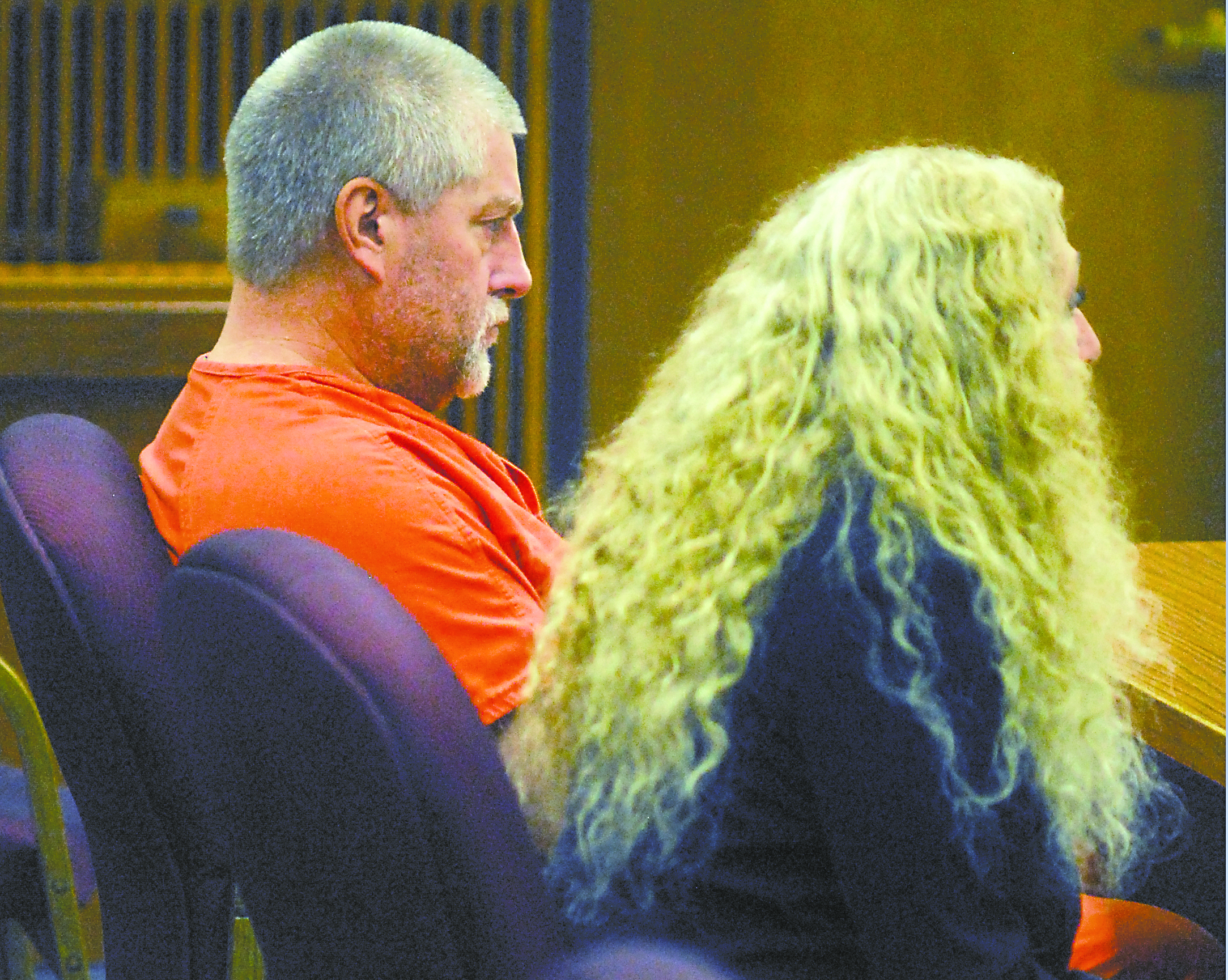 Barry Swegle sits in Clallam County Superior Court alongside his lawyer