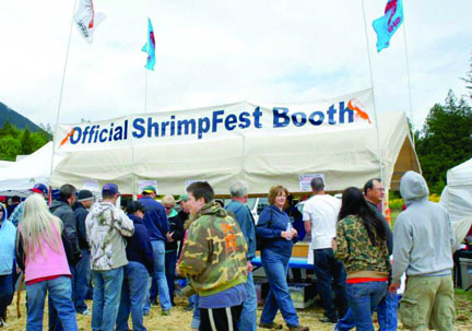 Crowds gather to buy the coveted Hood Canal spot shrimp at the 2013 Brinnon ShrimpFest. Phil Thenstedt