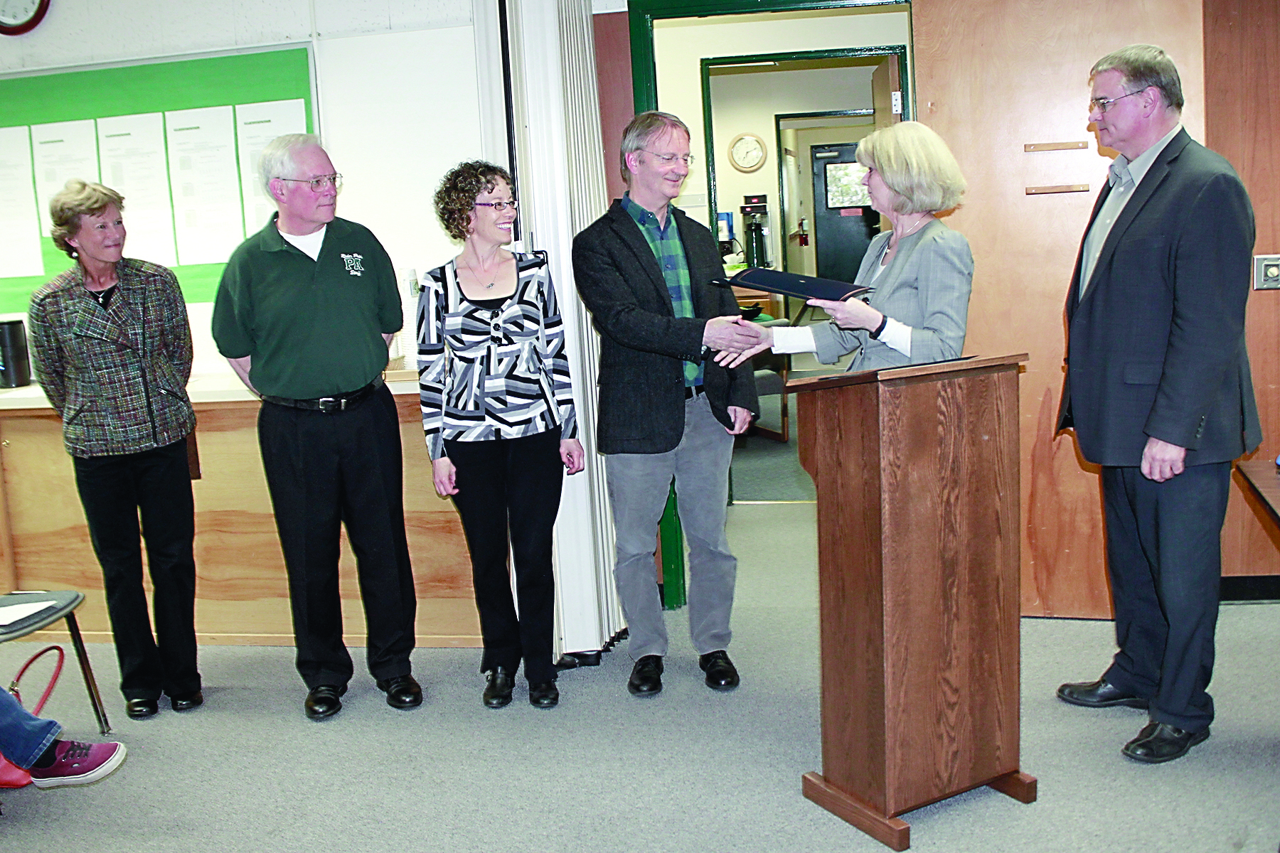 Teachers are honored at a Port Angeles School District board meeting to recognize Teacher Appreciation Week. From left are Mimi Tiderman