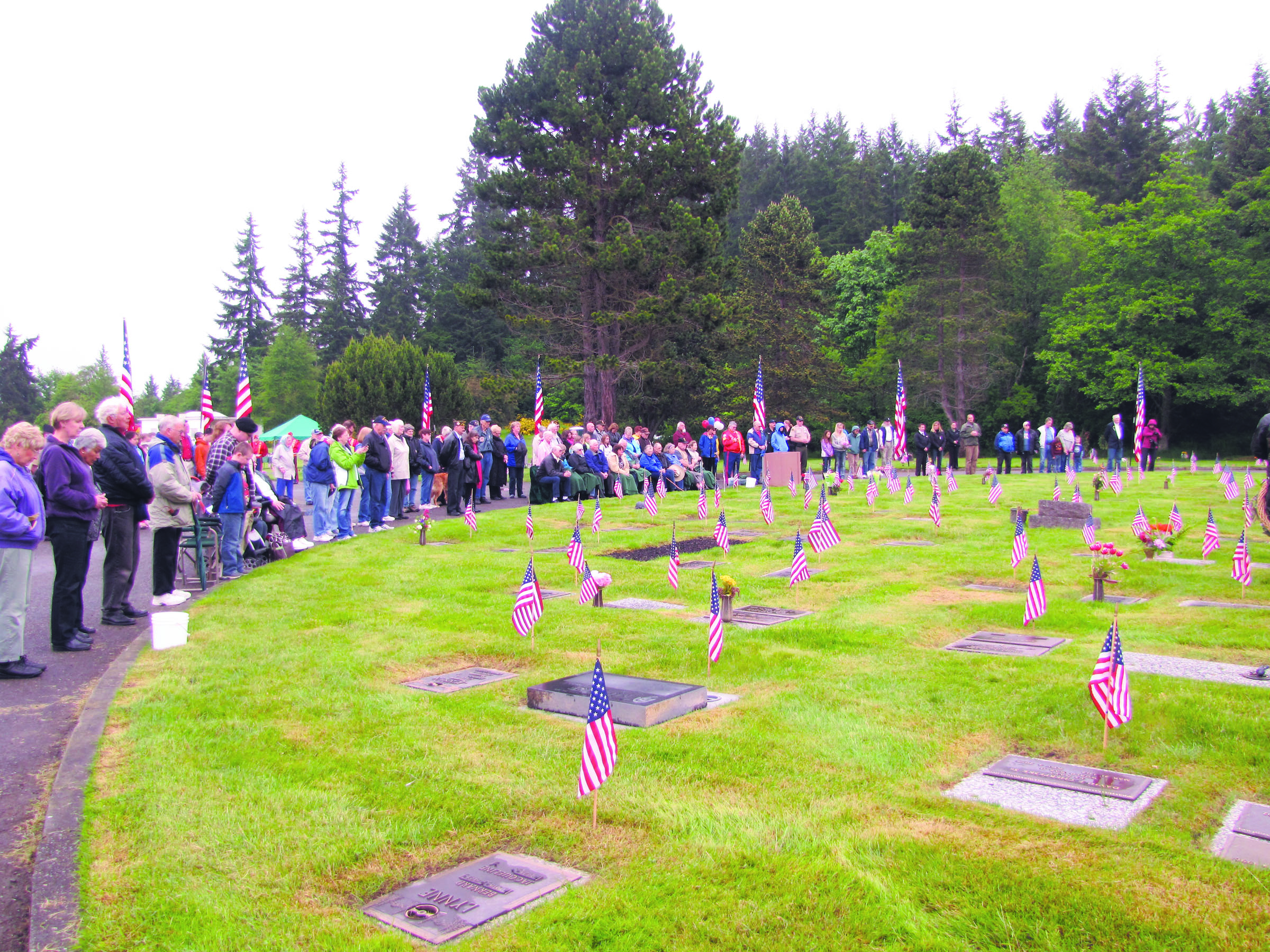 More than 100 veterans and others gather to pay their respects at Mount Angeles Memorial Park for a Memorial Day ceremony.  -- Photo by Arwyn Rice/Peninsula Daily News