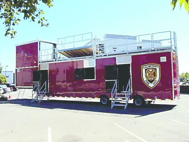 The mobile training simulator is shown outside the factory in Corona