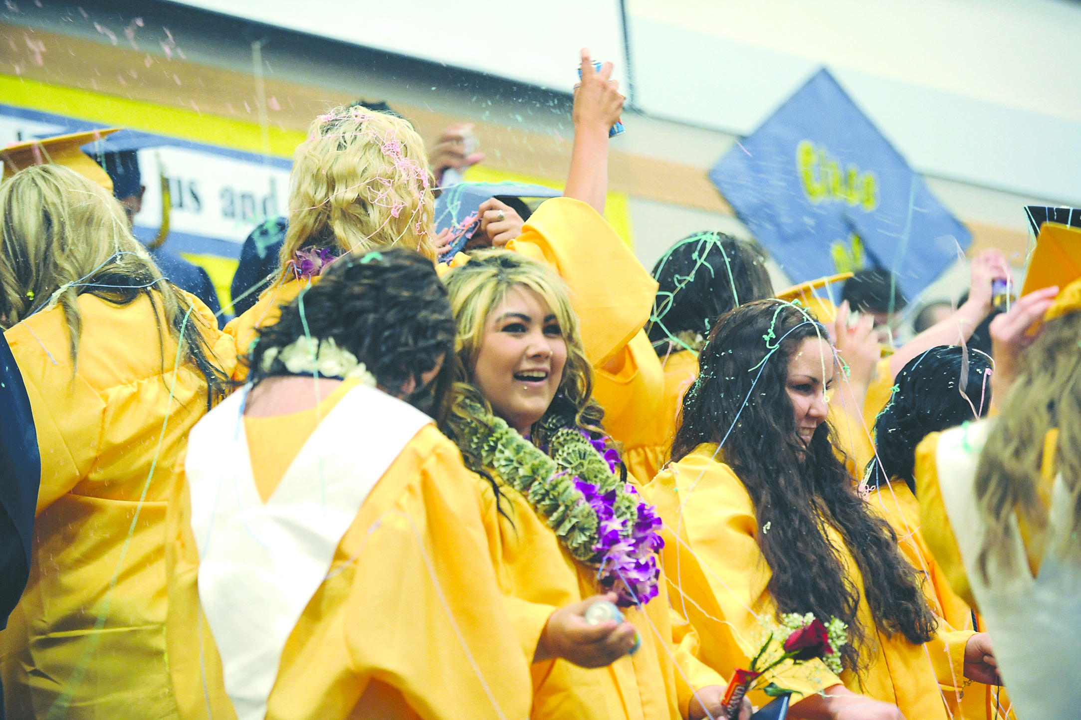 Members of the Forks Class of 2013 celebrate their graduation Saturday evening at the Forks High School gymnasium. The Quillayute Valley School District awarded diplomas to 65 students from Forks High School and Forks Alternative High School during the ceremony. The class valedictorian Rachel Harner was accepted to Harvard University in Cambridge