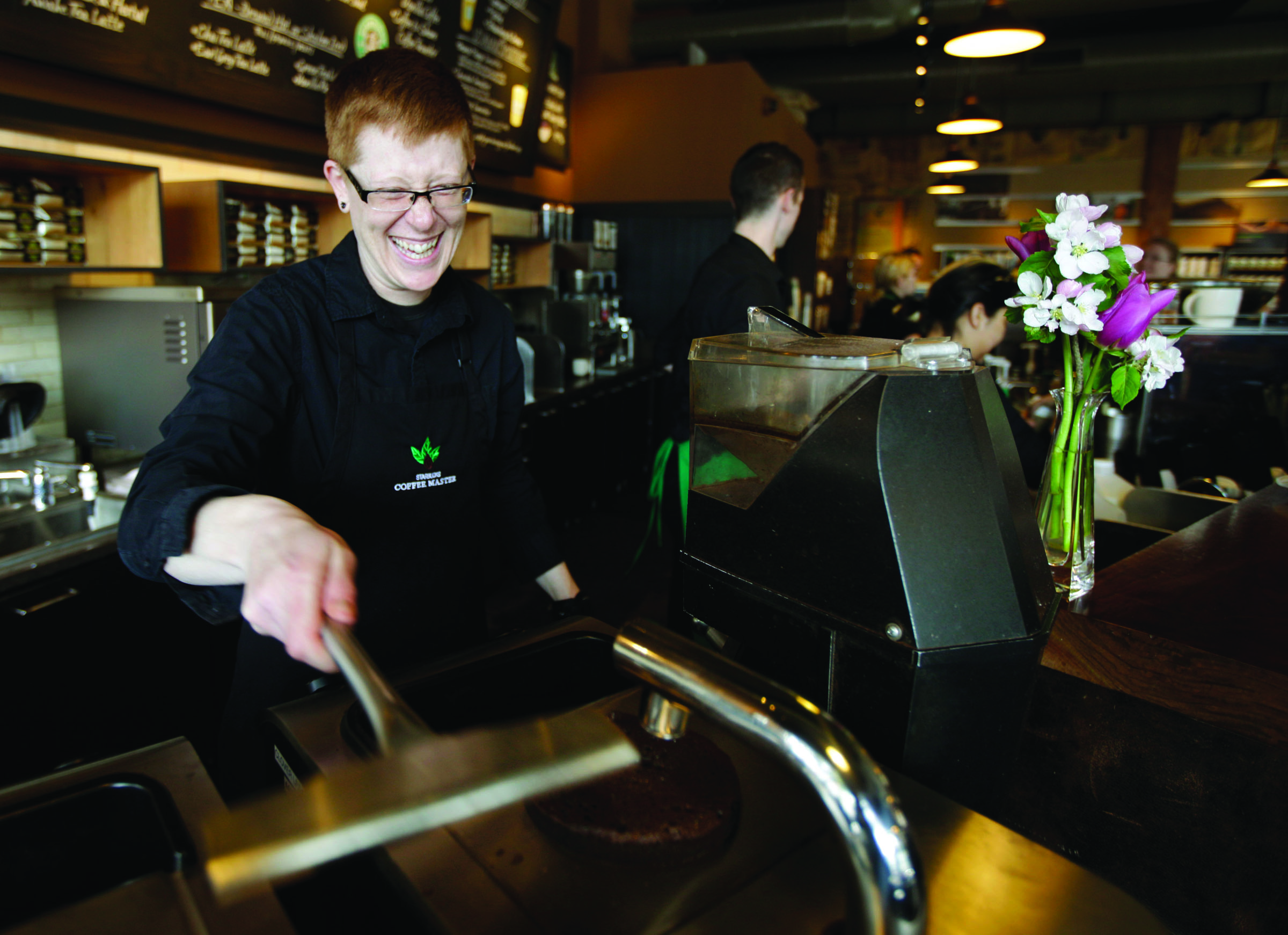 Starbucks barista Linsey Pringle prepares a cup of coffee at a Starbucks Corp. store in Seattle on April 27