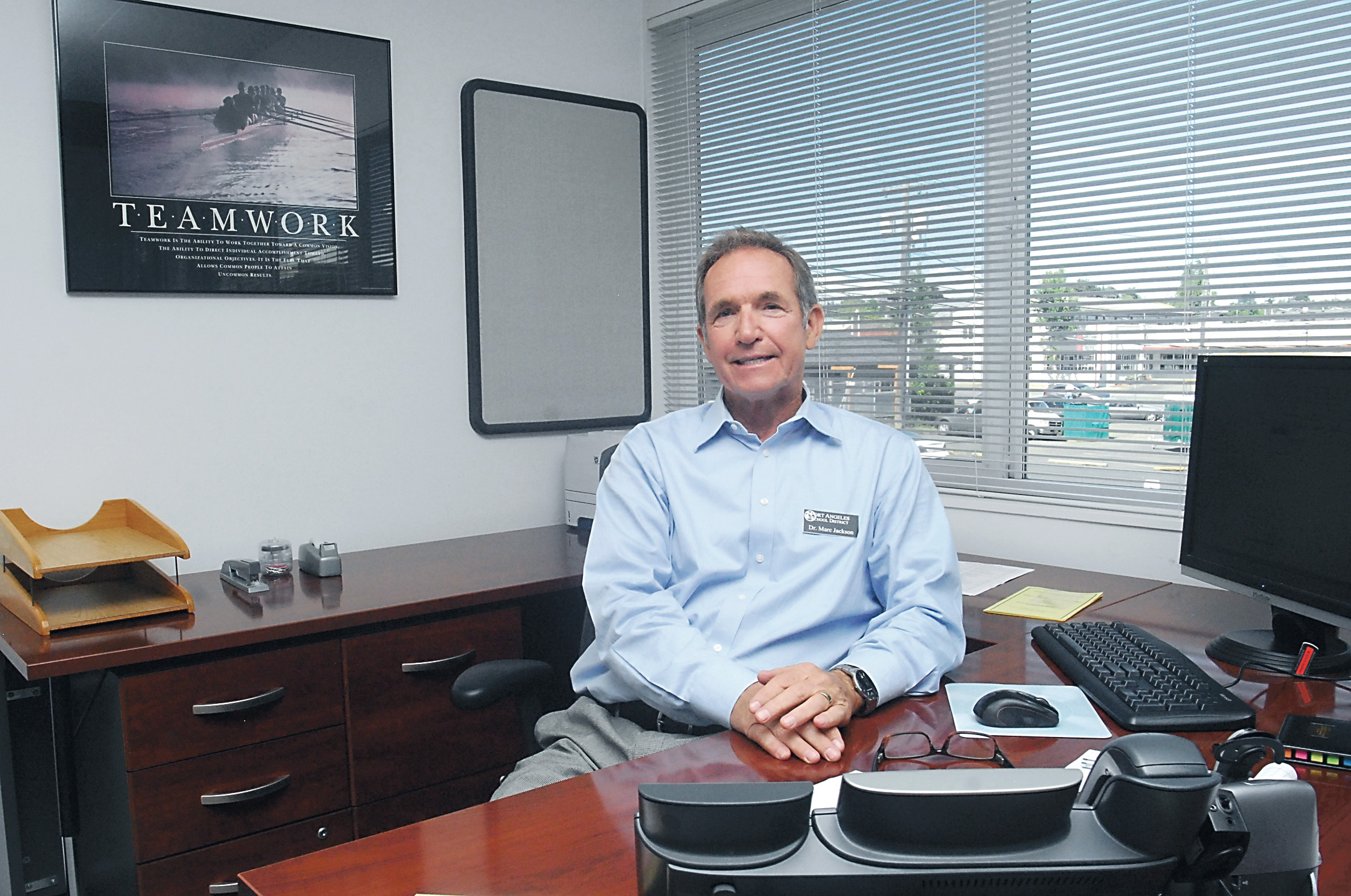 Marc Jackson pauses in his new office at Port Angeles School District headquarters.  —Photo by Keith Thorpe/Peninsula Daily News