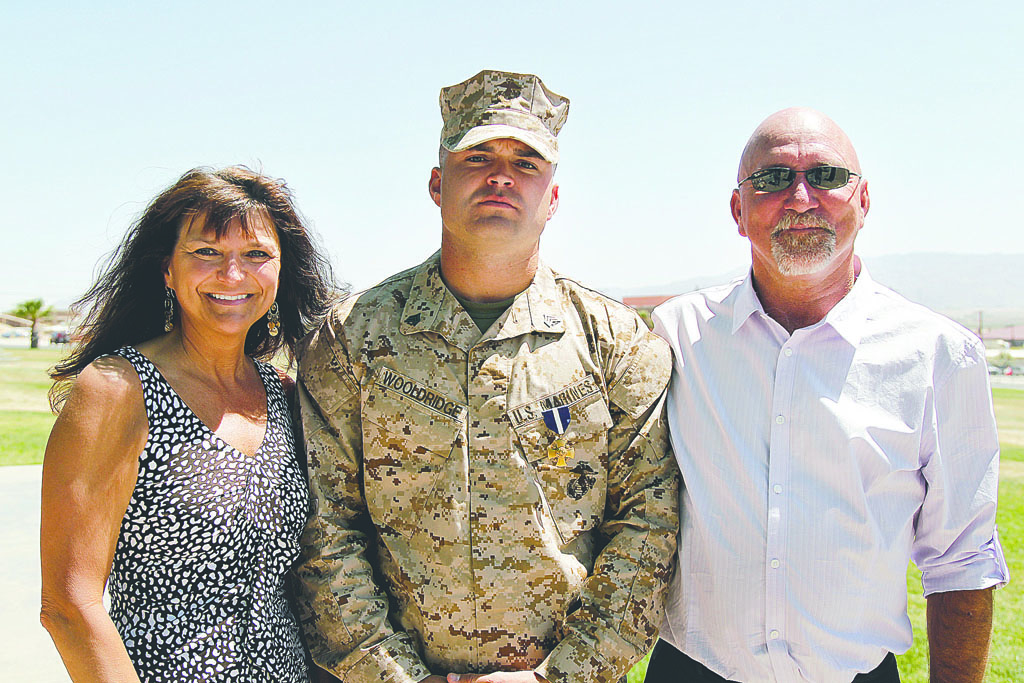 Cliff Wooldridge is shown with his parents