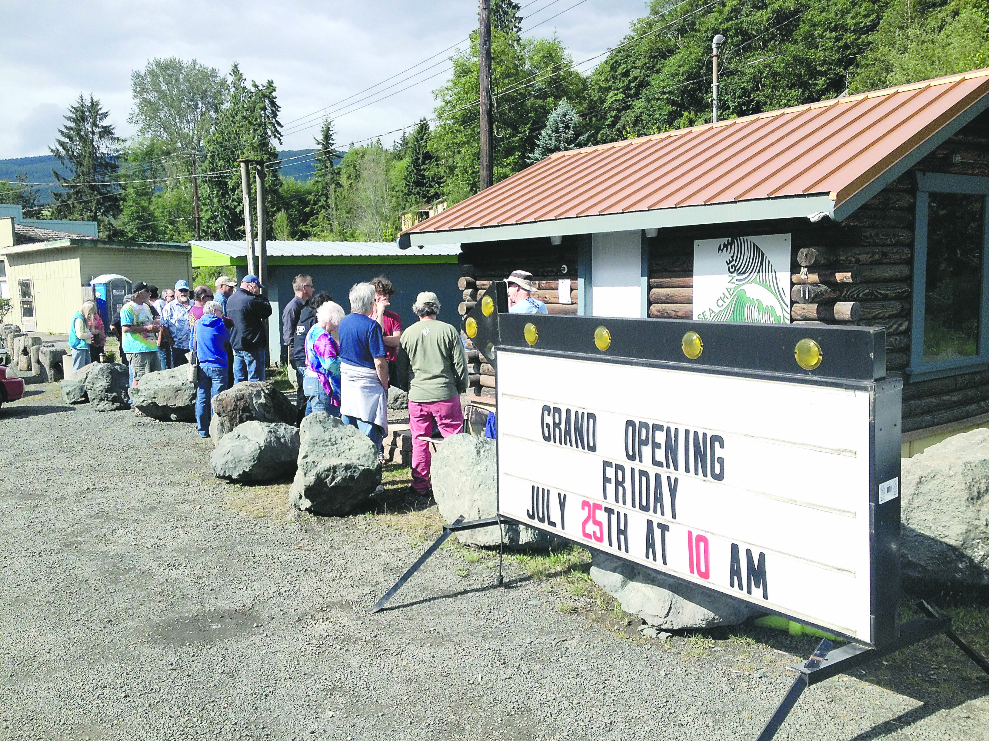 Customers line up Friday morning waiting for Sea Change Cannabis in Discovery Bay to open for its first day of business. Joe Smillie/Peninsula Daily News