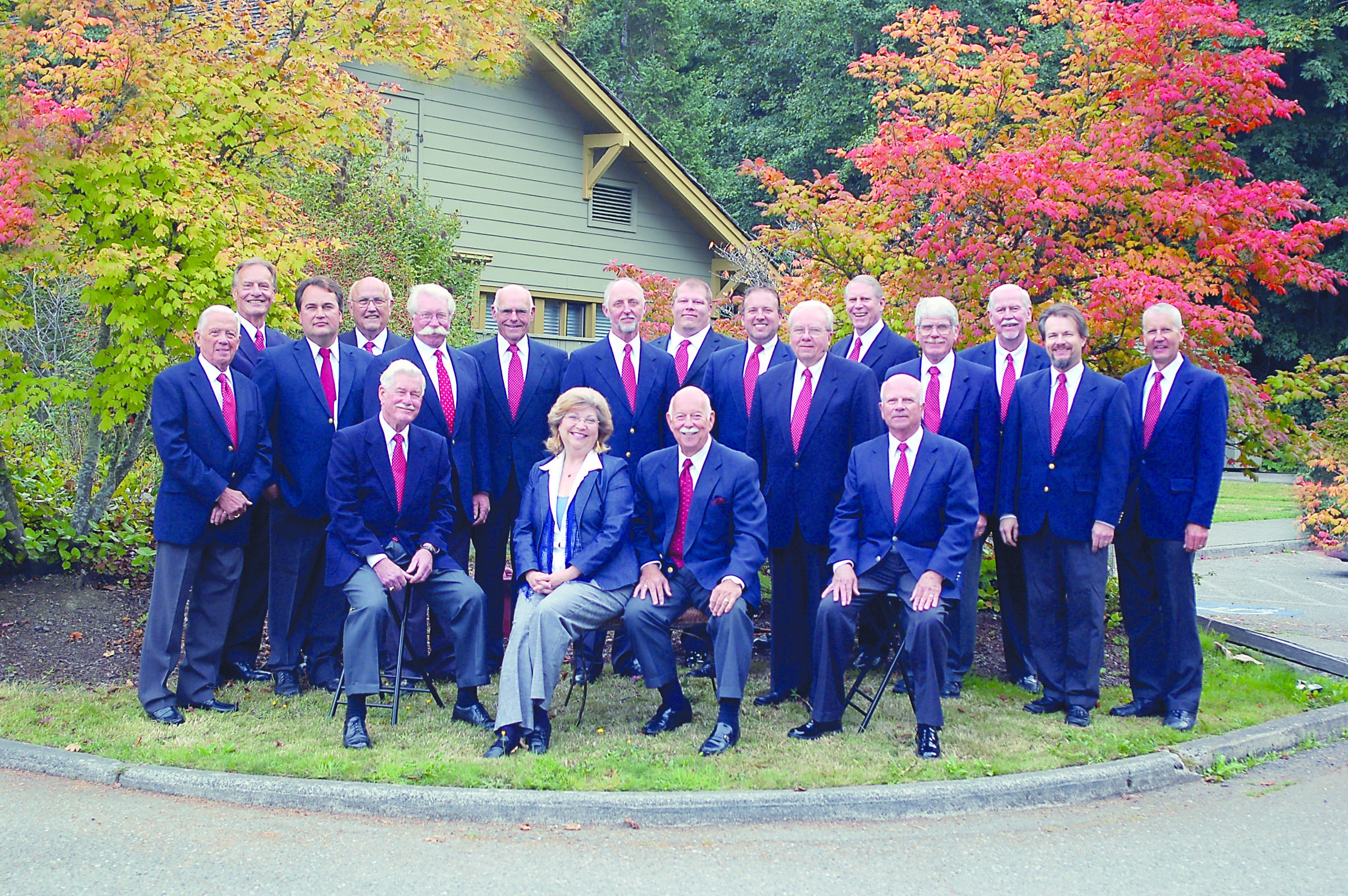 Peninsula Men's Gospel Singers shown with accompanist Penny Hall and director Lee Moseley