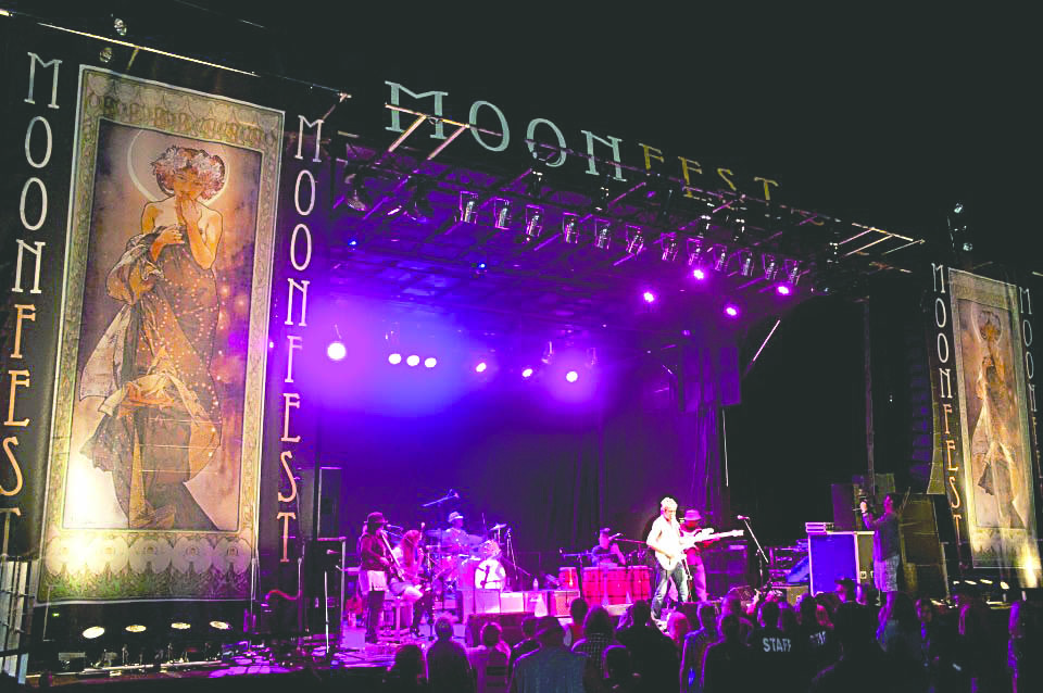 Roger Fisher leads his band at the 2013 Moonfest at Lake Leland in Jefferson County.