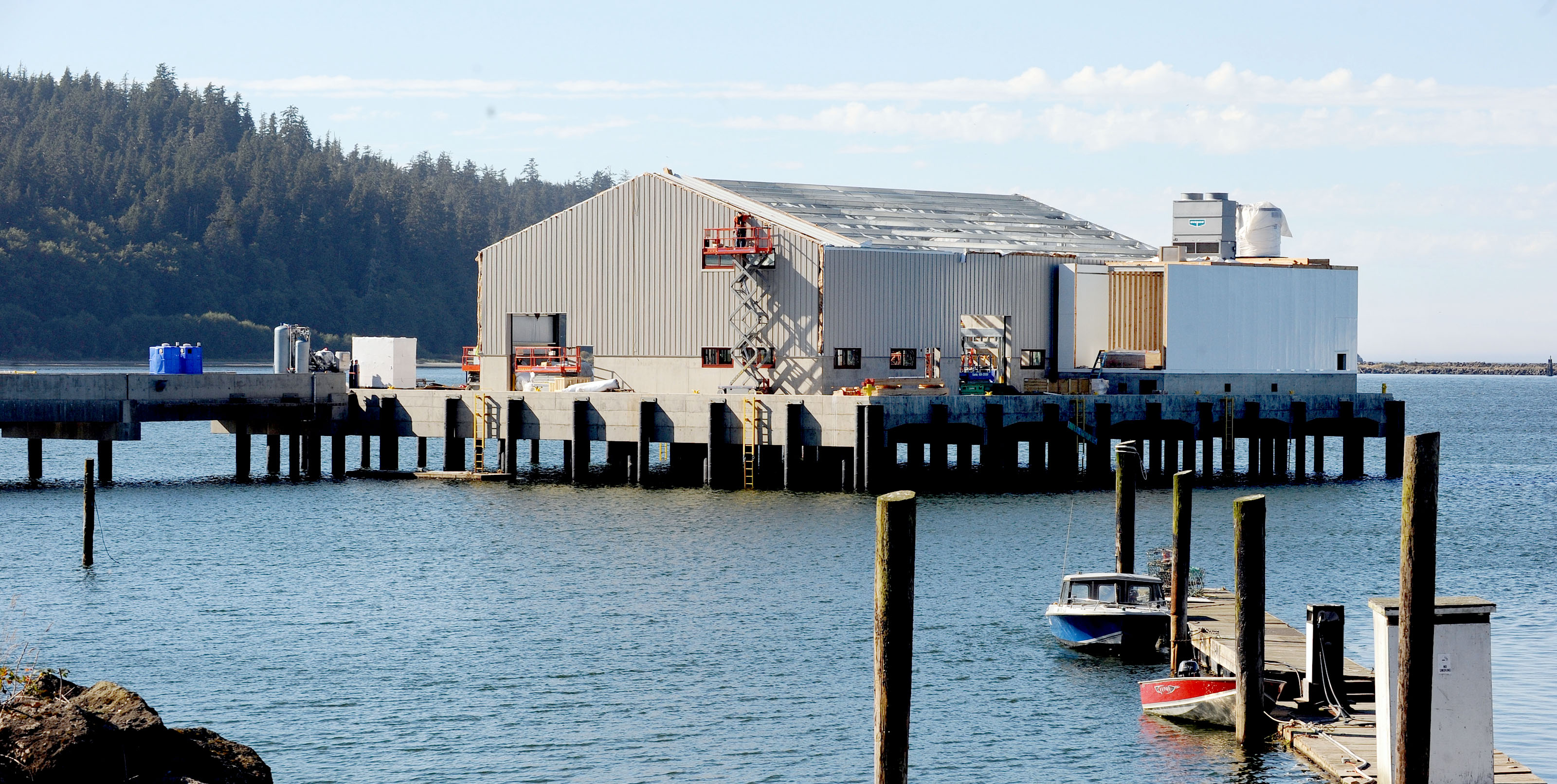 Work continues on an ice house that highlights a 400-foot commercial dock under construction in Neah Bay.  —Photo by Lonnie Archibald/for Peninsula Daily News