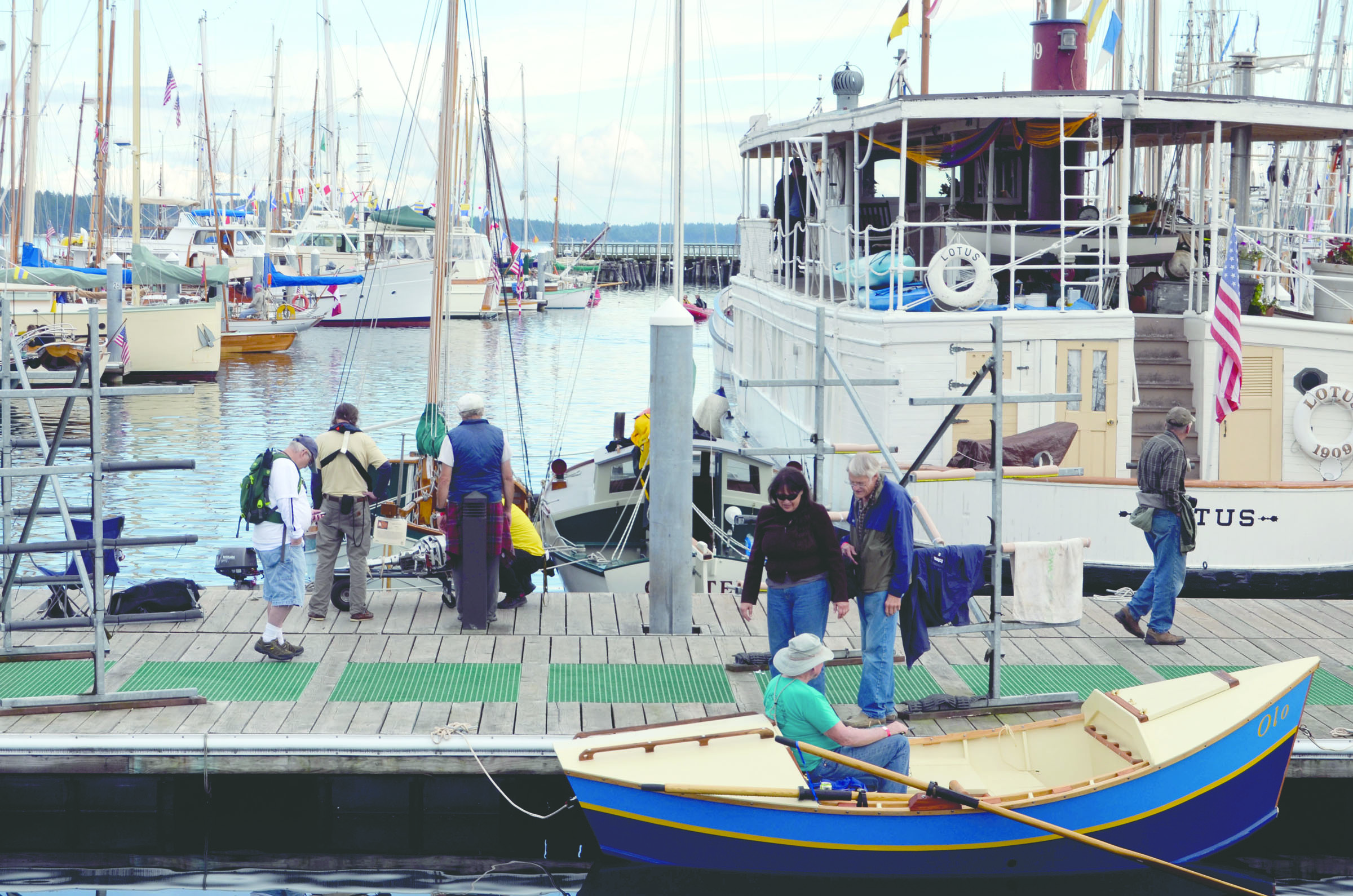 Crowds at the Wooden Boat Festival peruse the exhibits both large and small.  -- Photo by Charlie Bermant/Peninsula Daily News