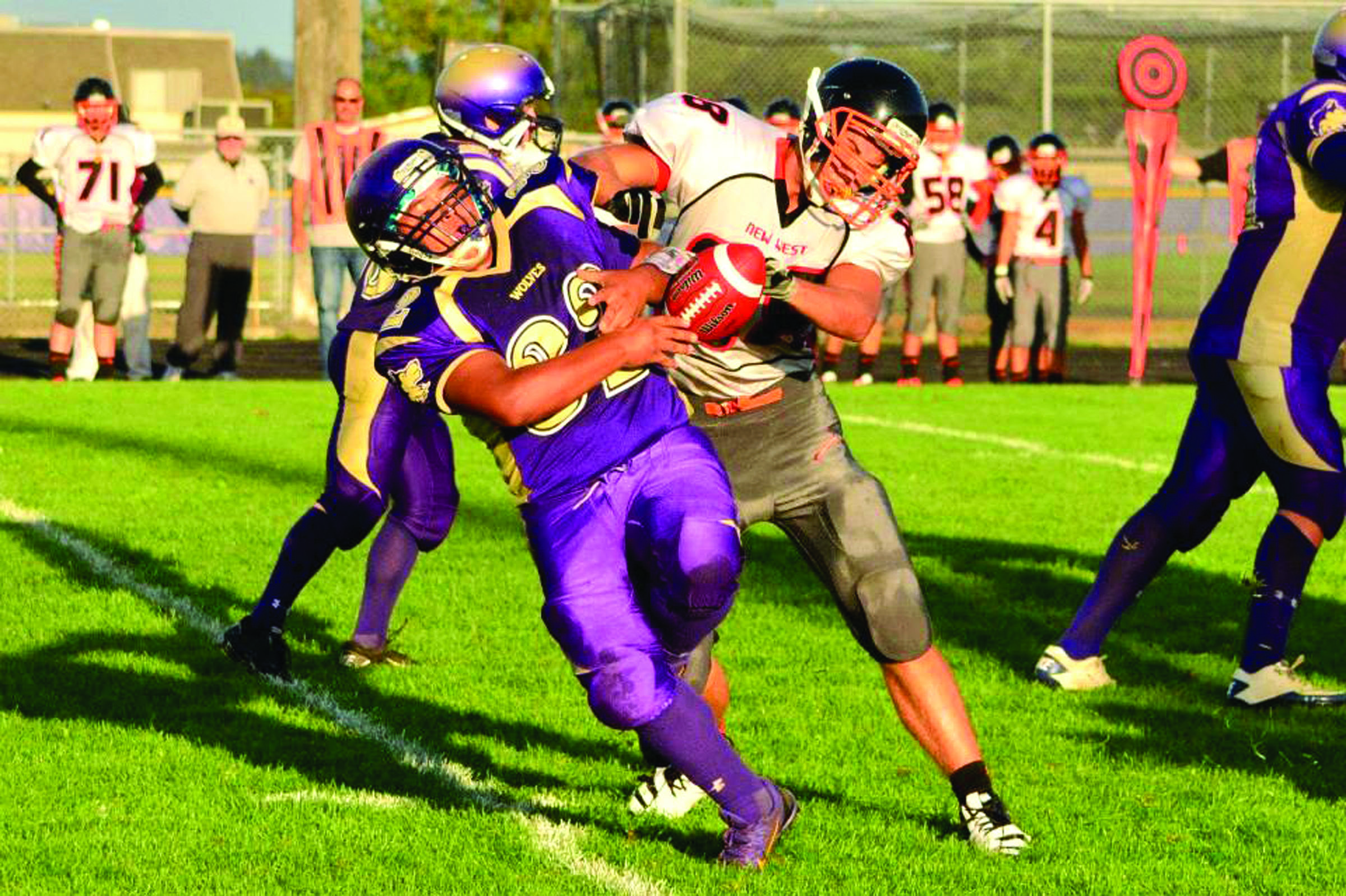 FOOTBALL: NFL following Sequim's lead with protective caps