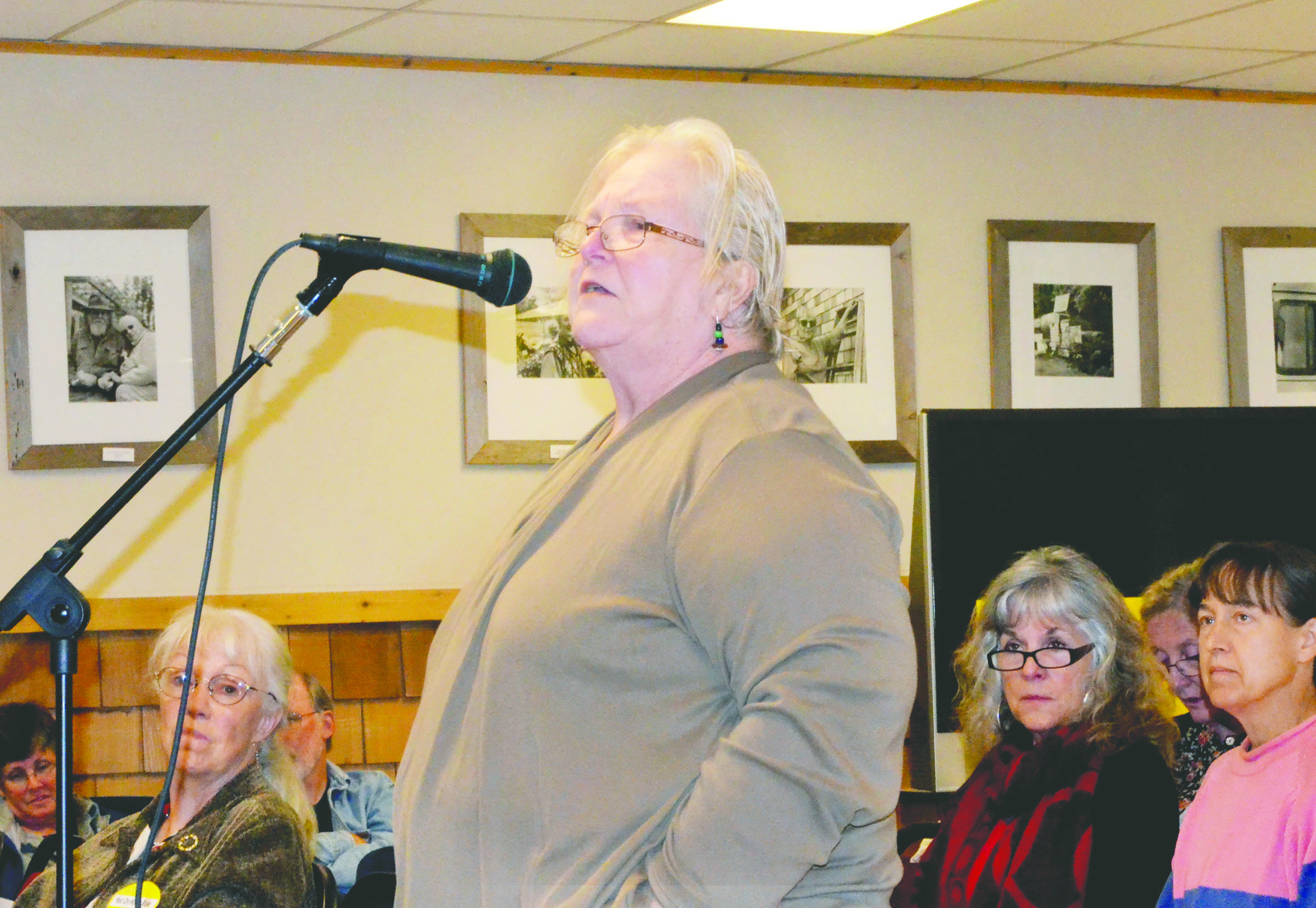 Cass Brotherton of Quilcene asks a question at the forum for freeholder candidates. The freeholders will write a new county charter if the voters approve going ahead with the process on Nov. 5.  -- Photo by Charlie Bermant/Peninsula Daily News