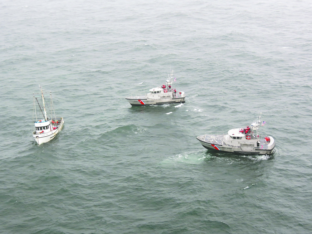 Two 47-foot Motor Life Boat crews from Coast Guard Station Quillayute River respond to help the crew of the Fjord Mist