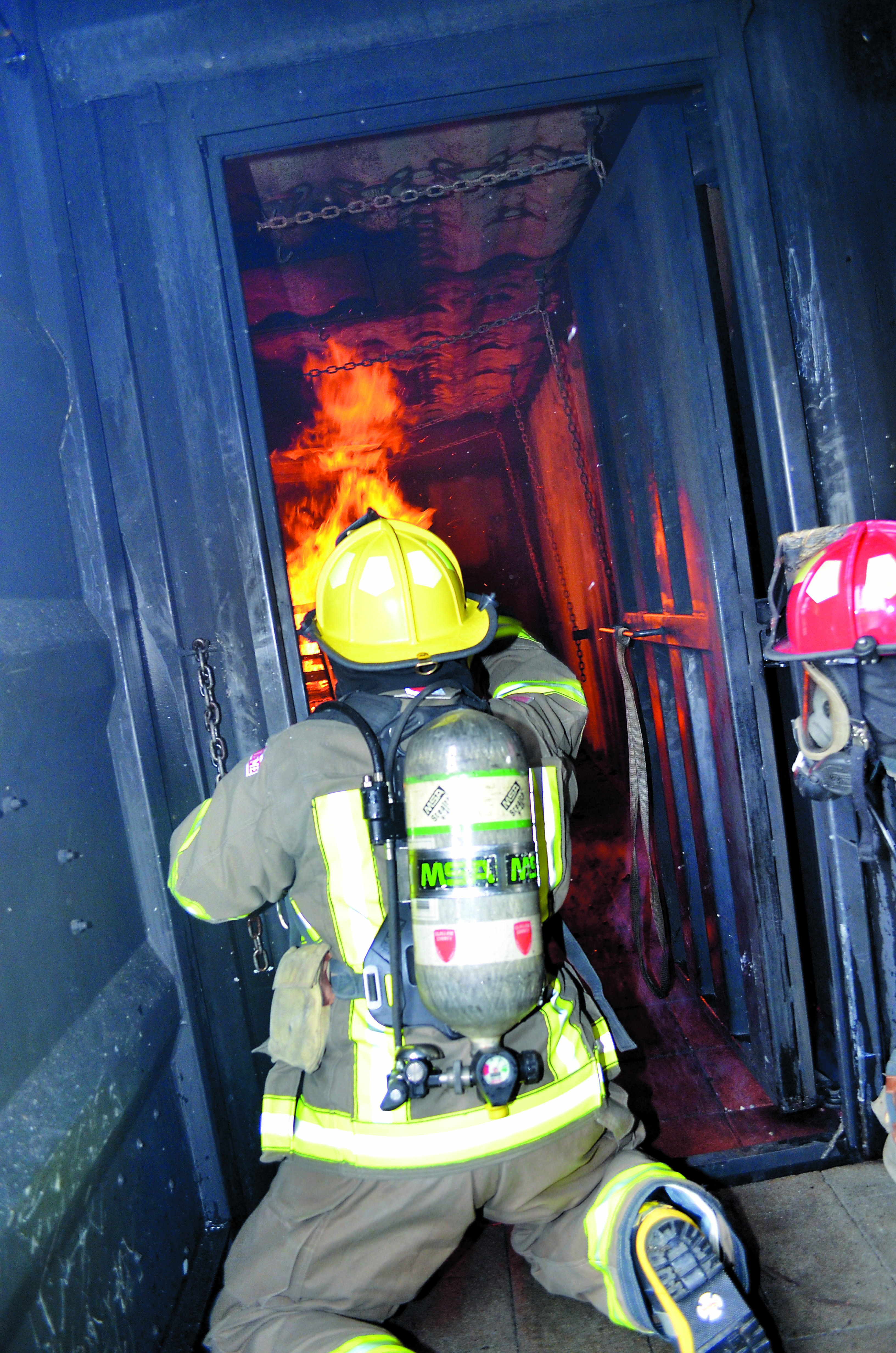 An unidentified trainee accompanied by Capt. Mark Lawson