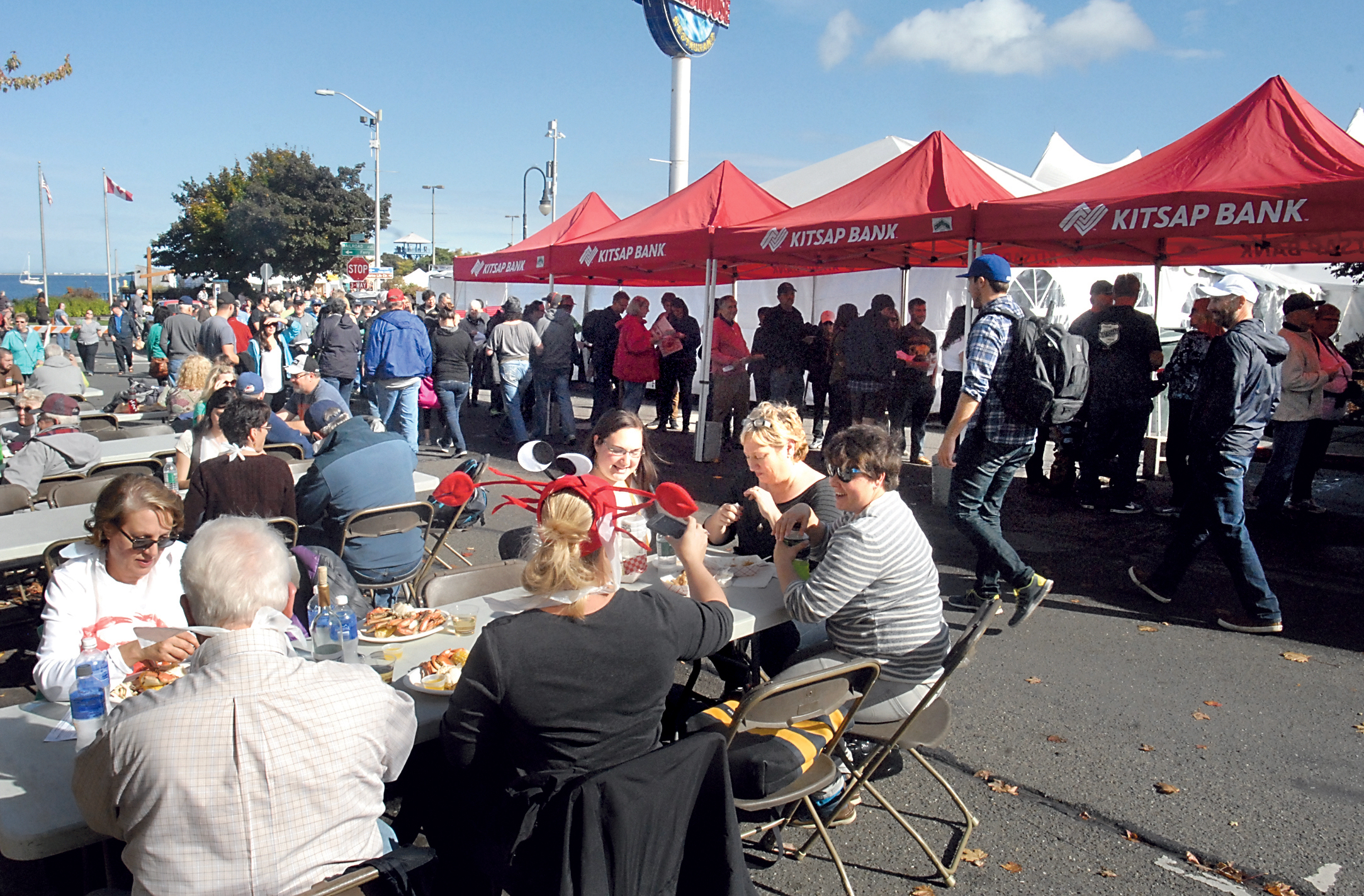 Crowds line up outside the Dungeness Crab & Seafood Festival main tent to purchase a crab dinner at the festival last year. The crowd included a large contingent of Canadians who arrived on the MV Coho ferry from Victoria. Keith Thorpe/Peninsula Daily News