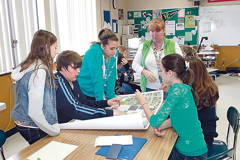 Port Angeles High School students consider the design of a new high school at a recent forum. Port Angeles High School