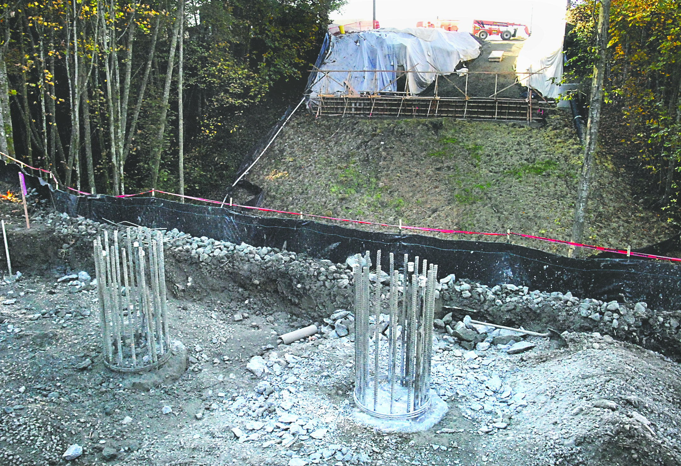 Steel reinforcement rods that will become the base for bridge supports stick up from the ground at the site of the future Lauridsen Boulevard bridge spanning Peabody Creek in Port Angeles.  -- Photo by Keith Thorpe/Peninsula Daily News