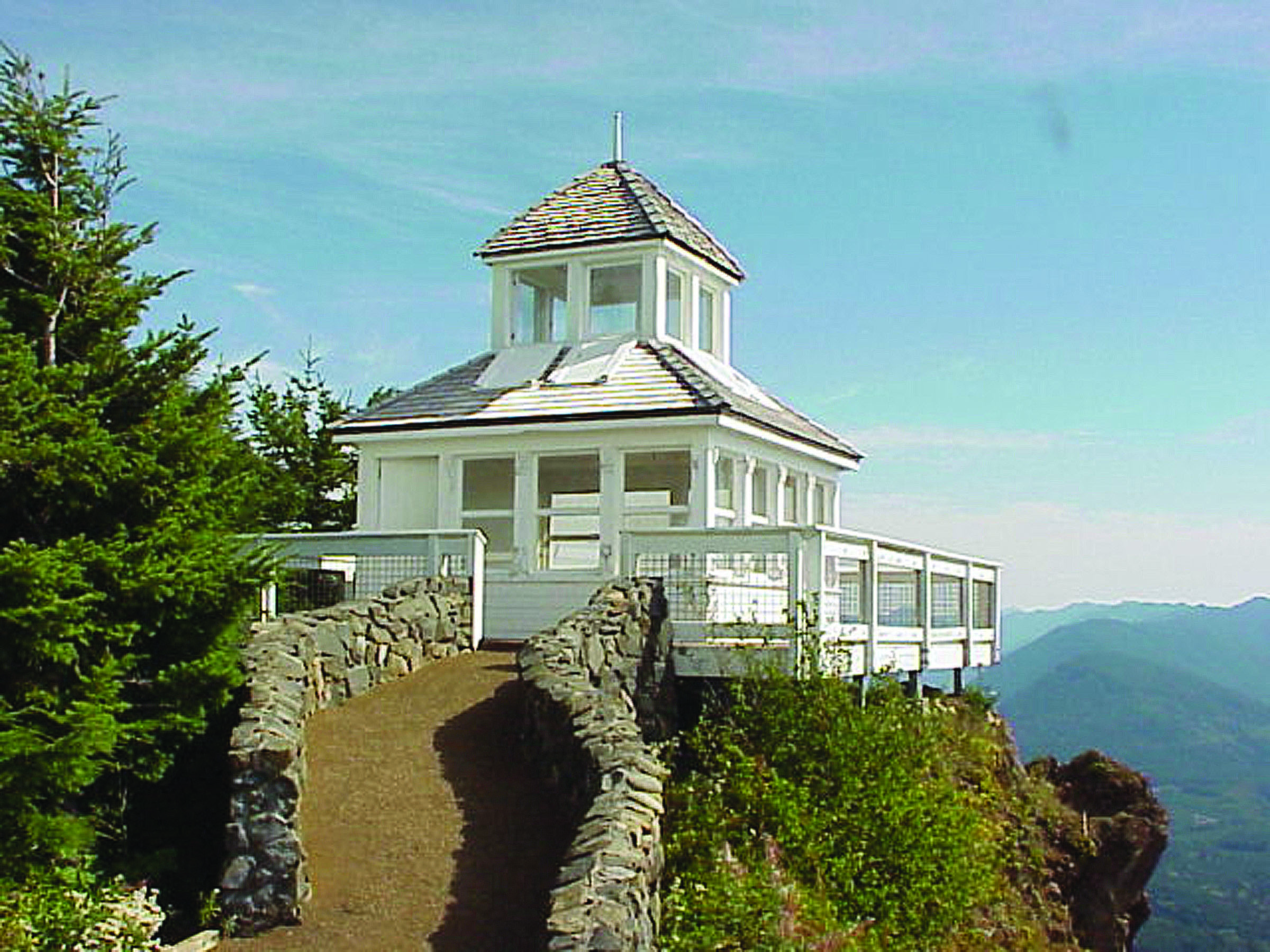 Olympic National Forest's Kloshe Nanitch Fire Lookout is shown on its perch over the Sol Duc Valley. The decayed structure