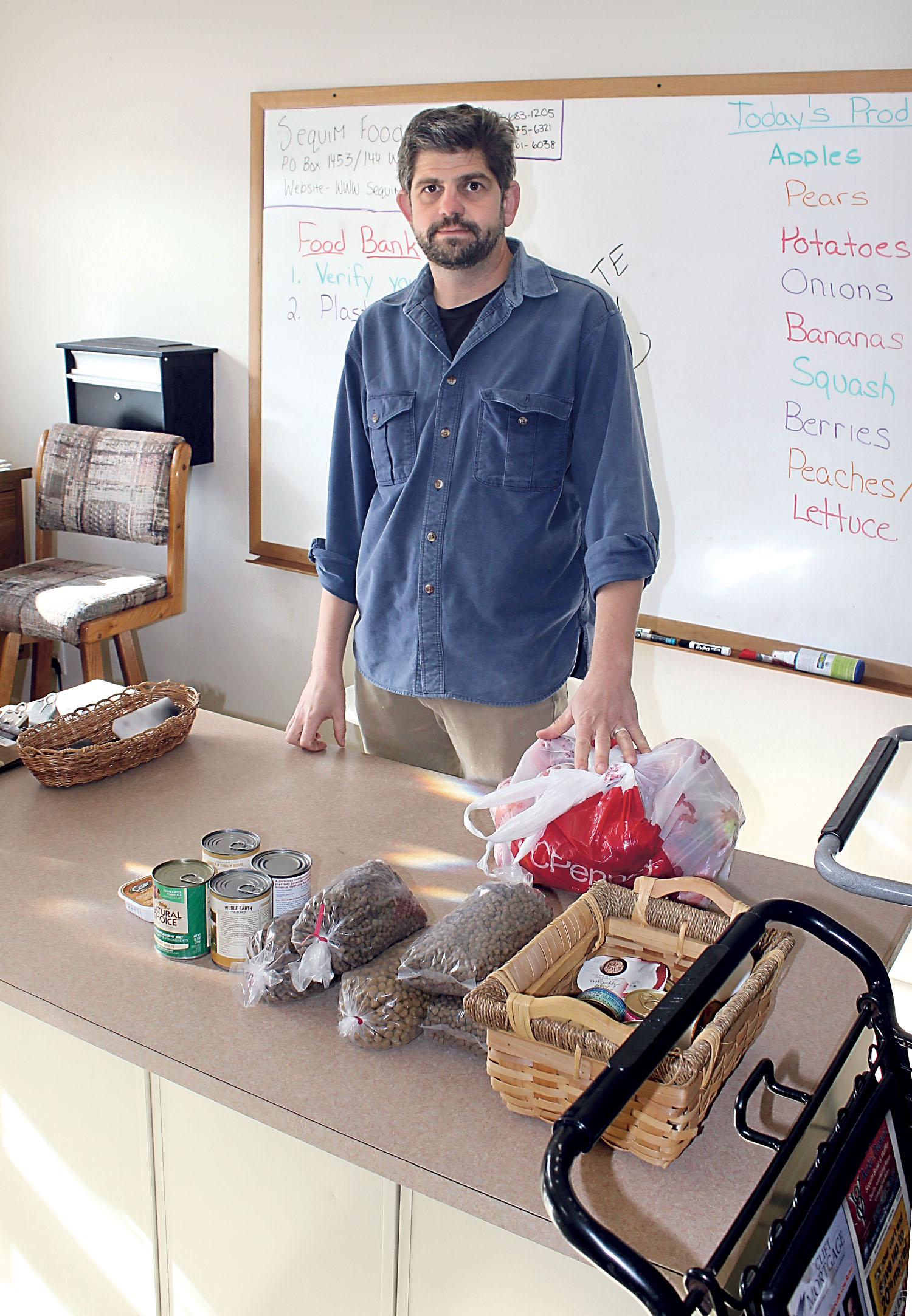 Sequim Food Bank Executive Director Mark Ozias.  —Photo by Mark St.J. Couhig/Peninsula Daily News